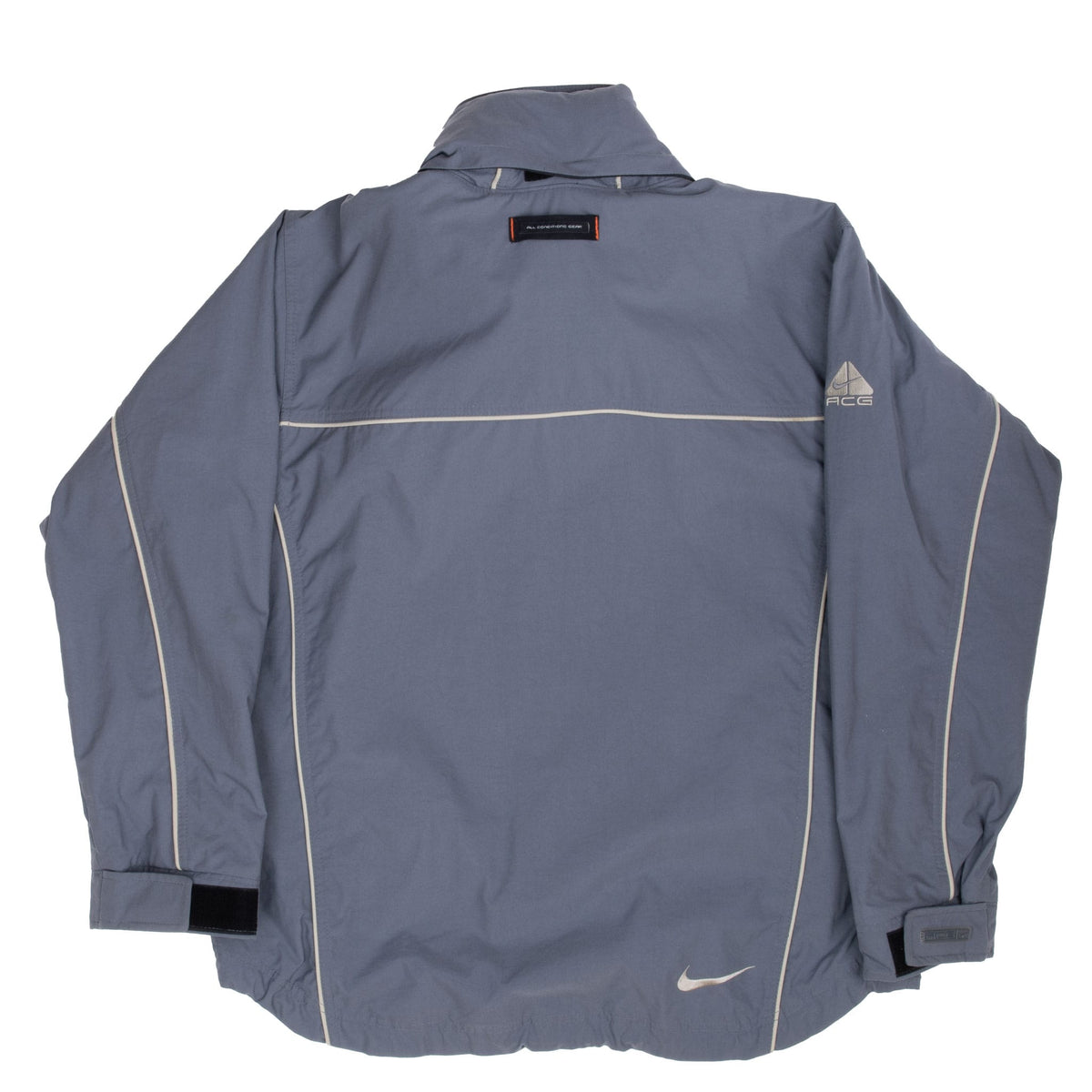 Back of grey Nike ACG windbreaker with contrast piping, embroidered logos and cuff tabs