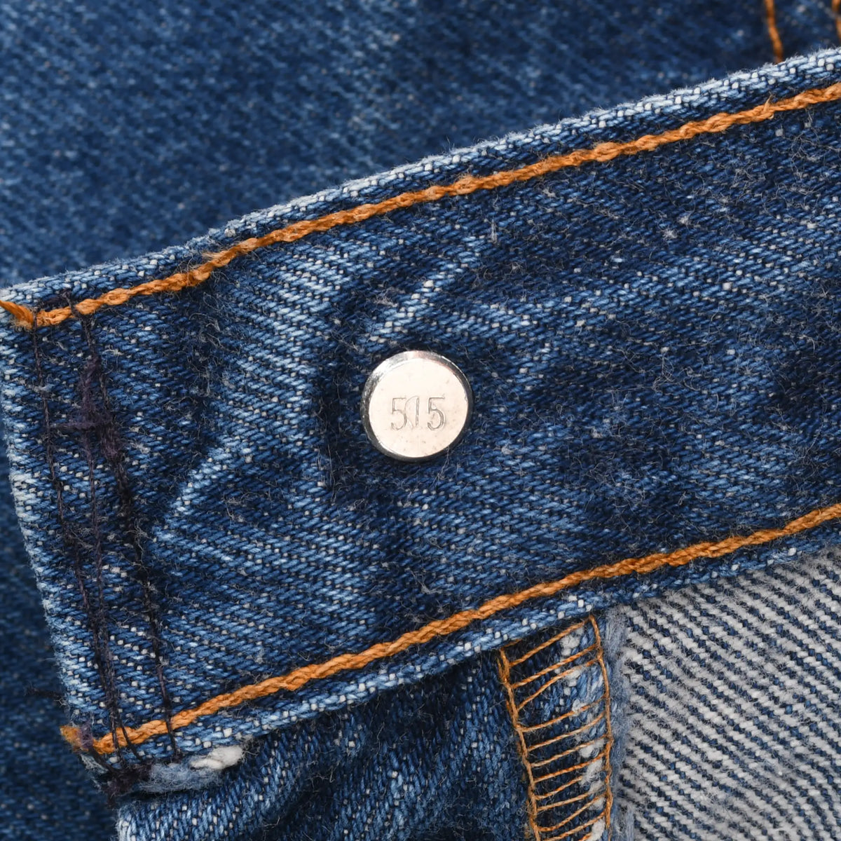 Interior waistband button stamped 515 on Levi's blue jeans