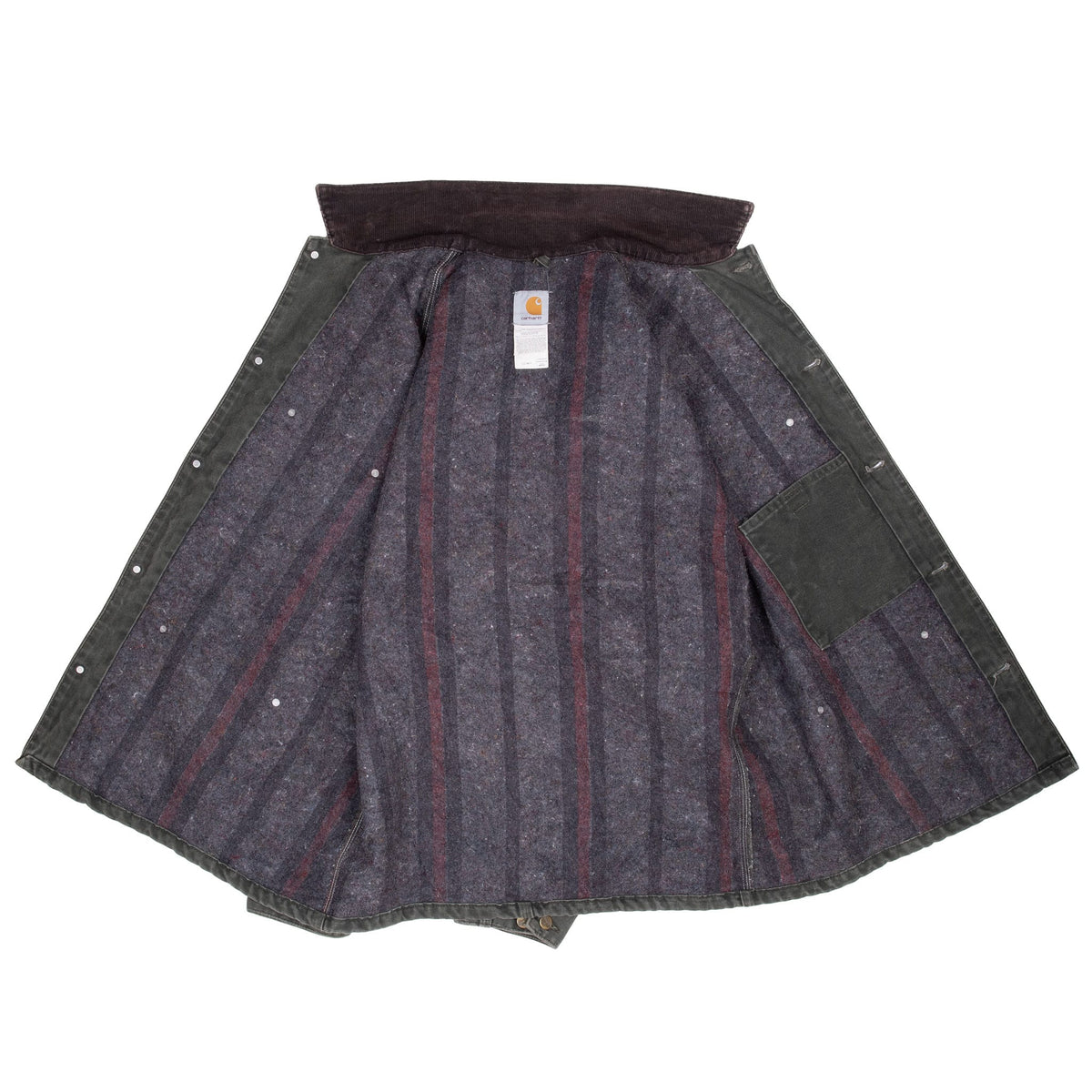 Open Carhartt chore jacket showing striped lining, interior pocket, and corduroy collar