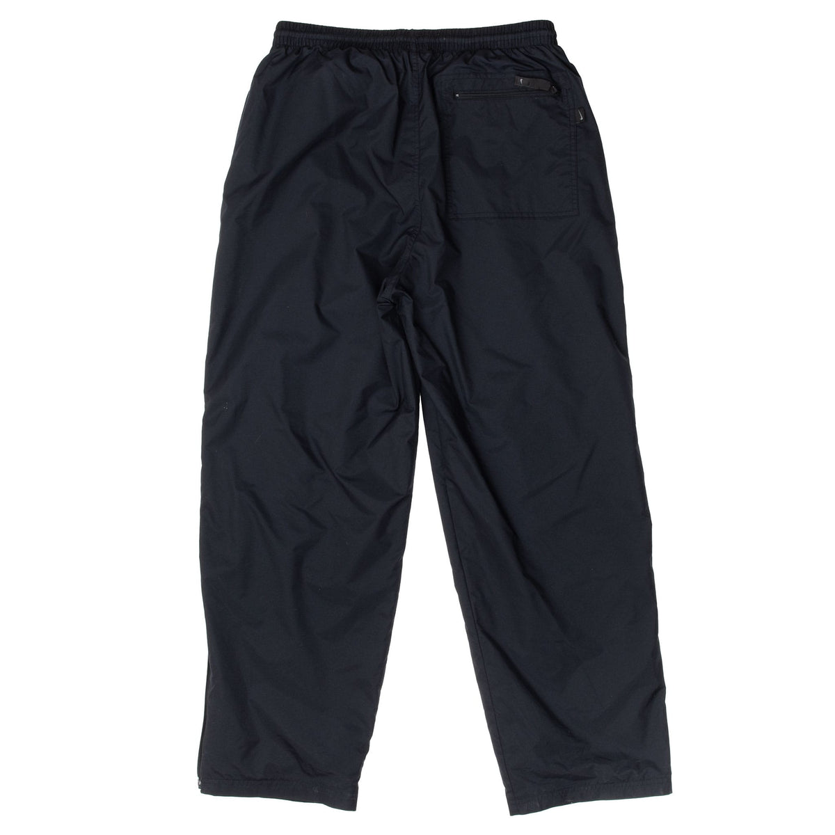 Back of black Nike track pants with zippered patch pocket and ankle zippers