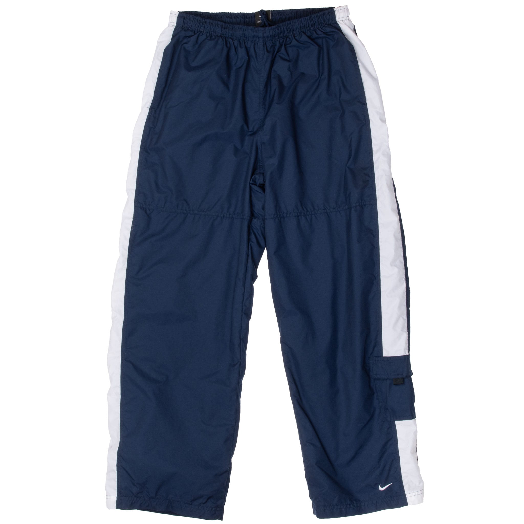 Front of blue Nike track pants with white side panels, cargo pocket, and embroidered Swoosh