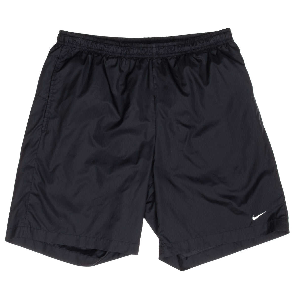 Front of black Nike swim trunks with elastic waistband and white Swoosh at hem