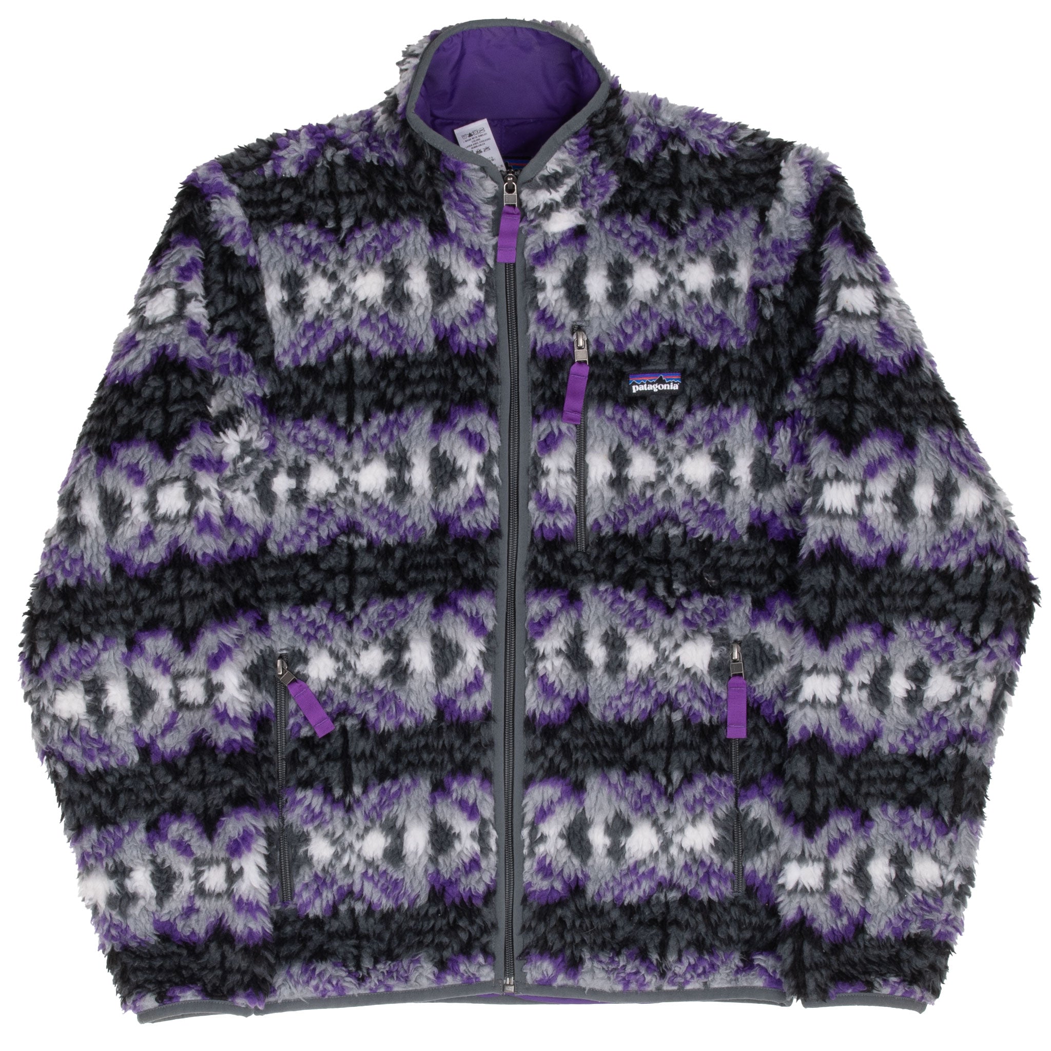 Full front view of Patagonia Retro-X patterned fleece jacket with three zip pockets