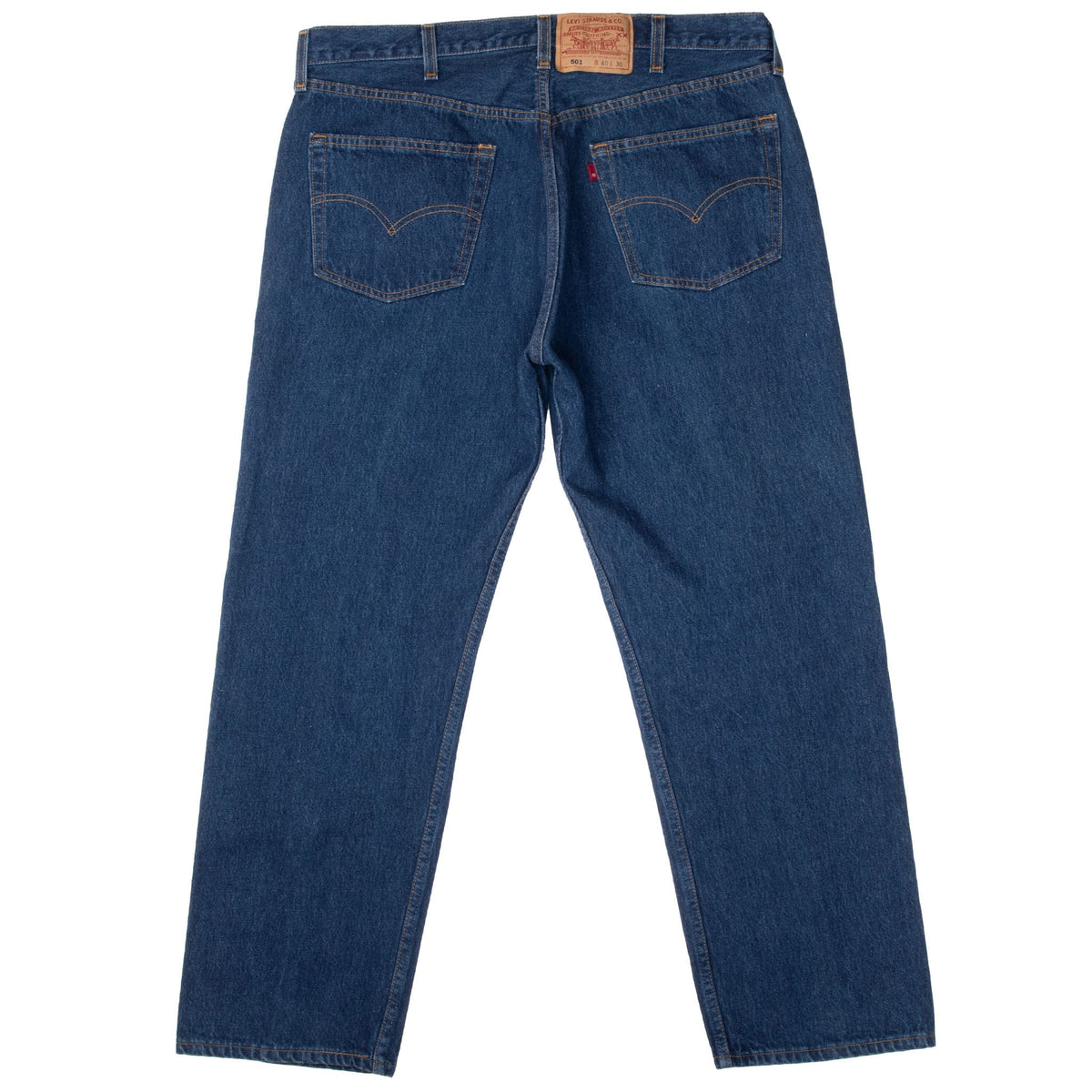 Back view of Levi's 501 indigo blue jeans with waist patch, red tab, and arcuate pocket stitching