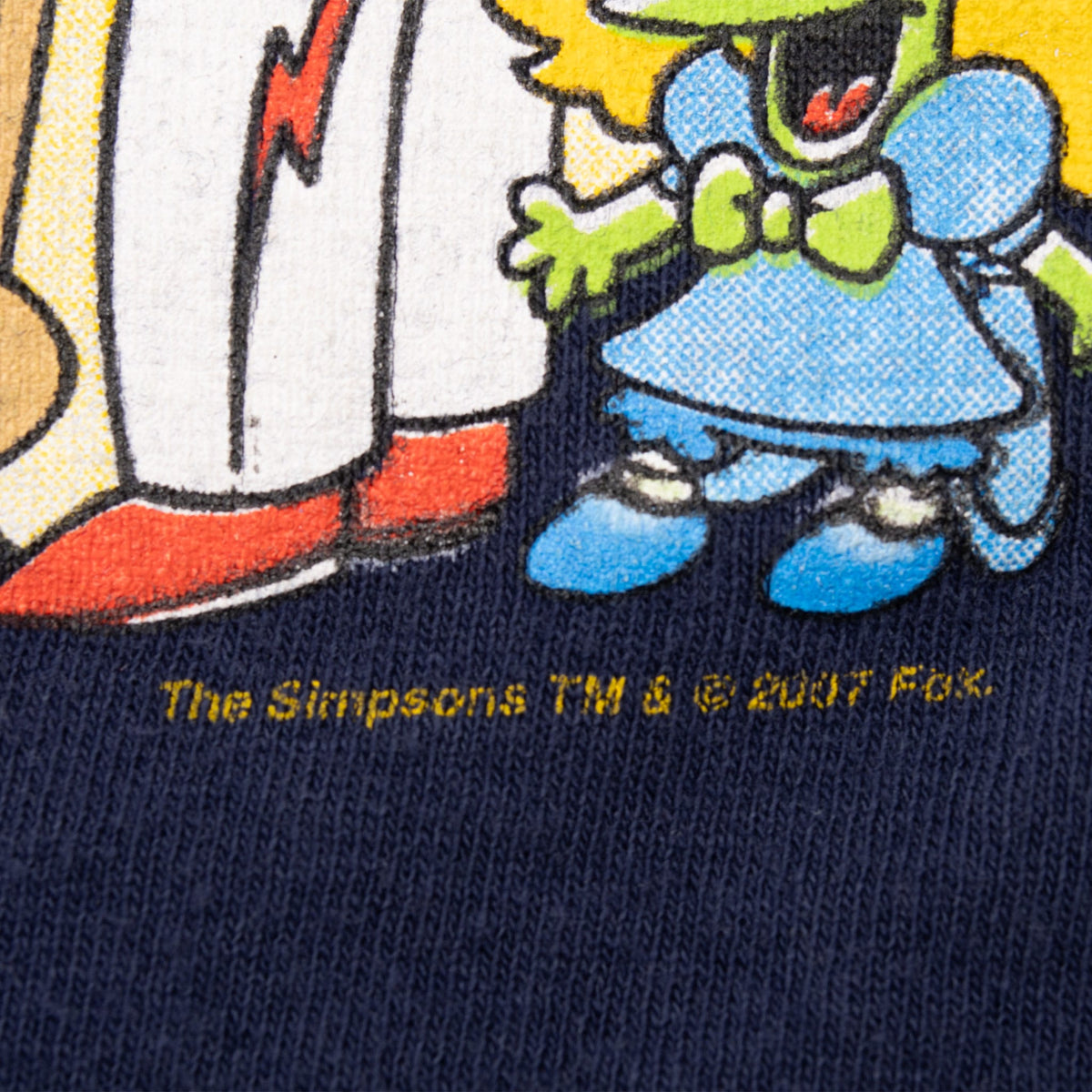 Close-up of front print with The Simpsons TM & © 2007 Fox text
