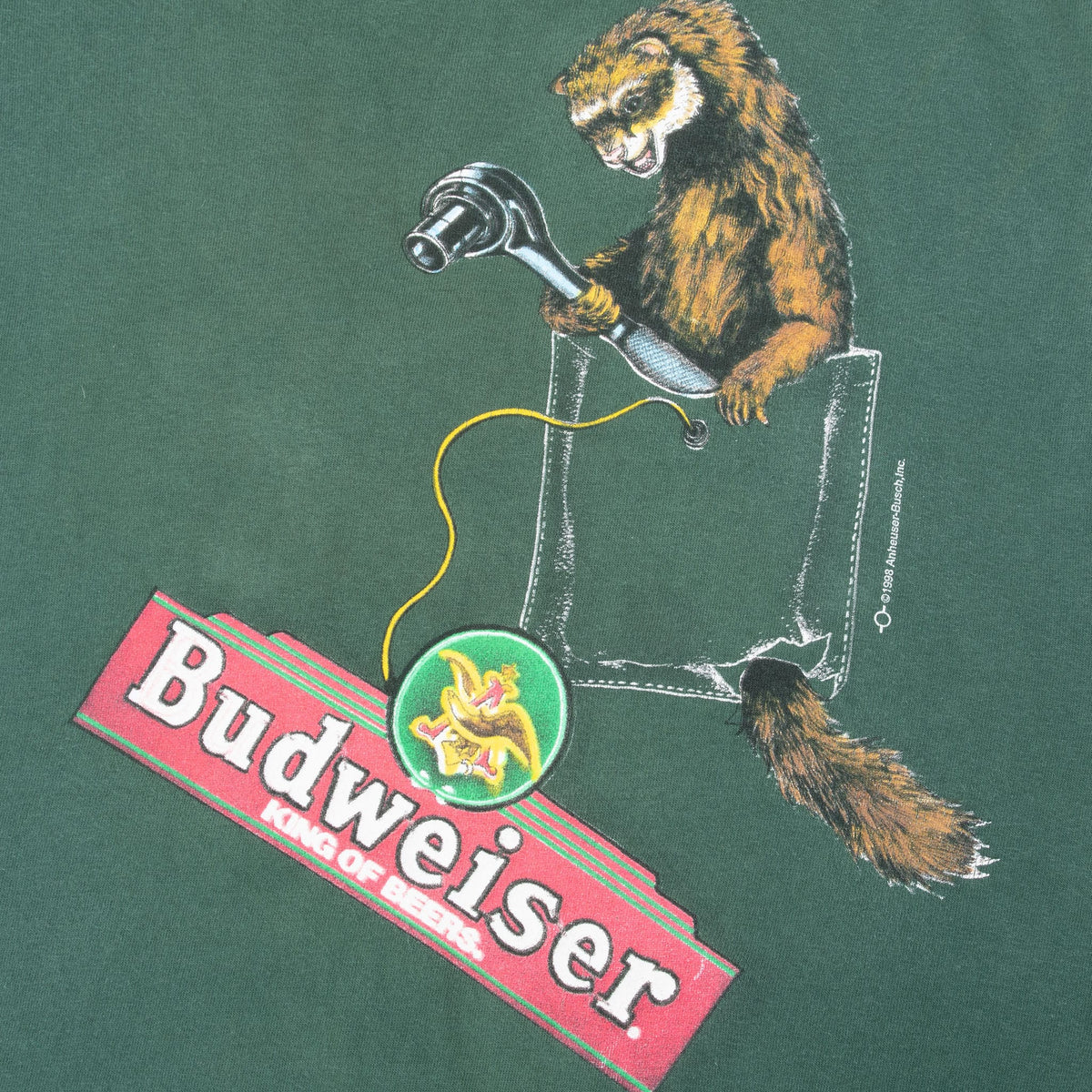 Close-up of front ferret holding a tap above the Budweiser logo graphic