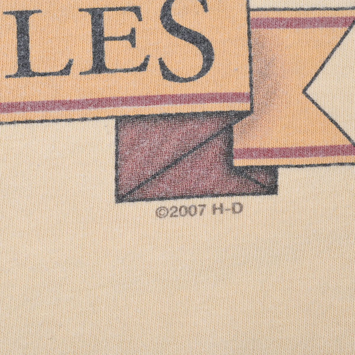 Close-up of 2007 H-D copyright mark beneath the front graphic