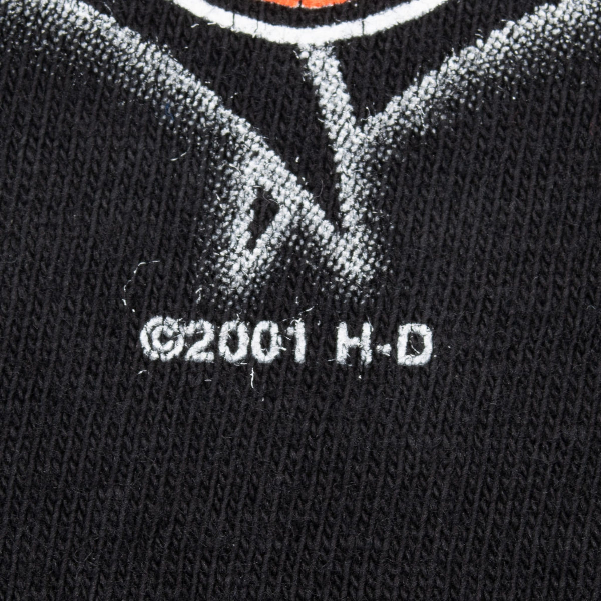 Close-up of ©2001 H-D marking beneath the front graphic