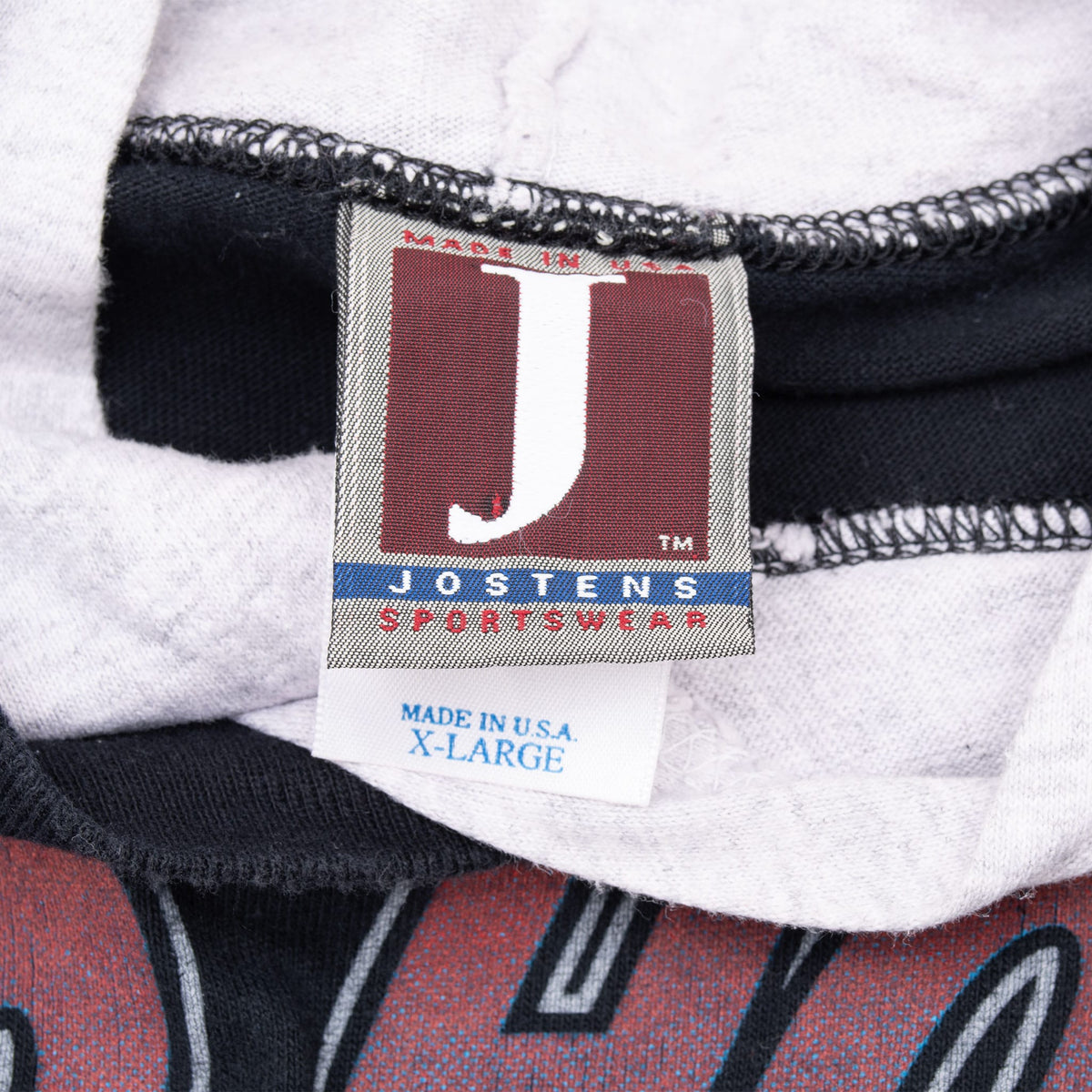 Jostens Sportswear neck tag marked Made in USA and X-Large