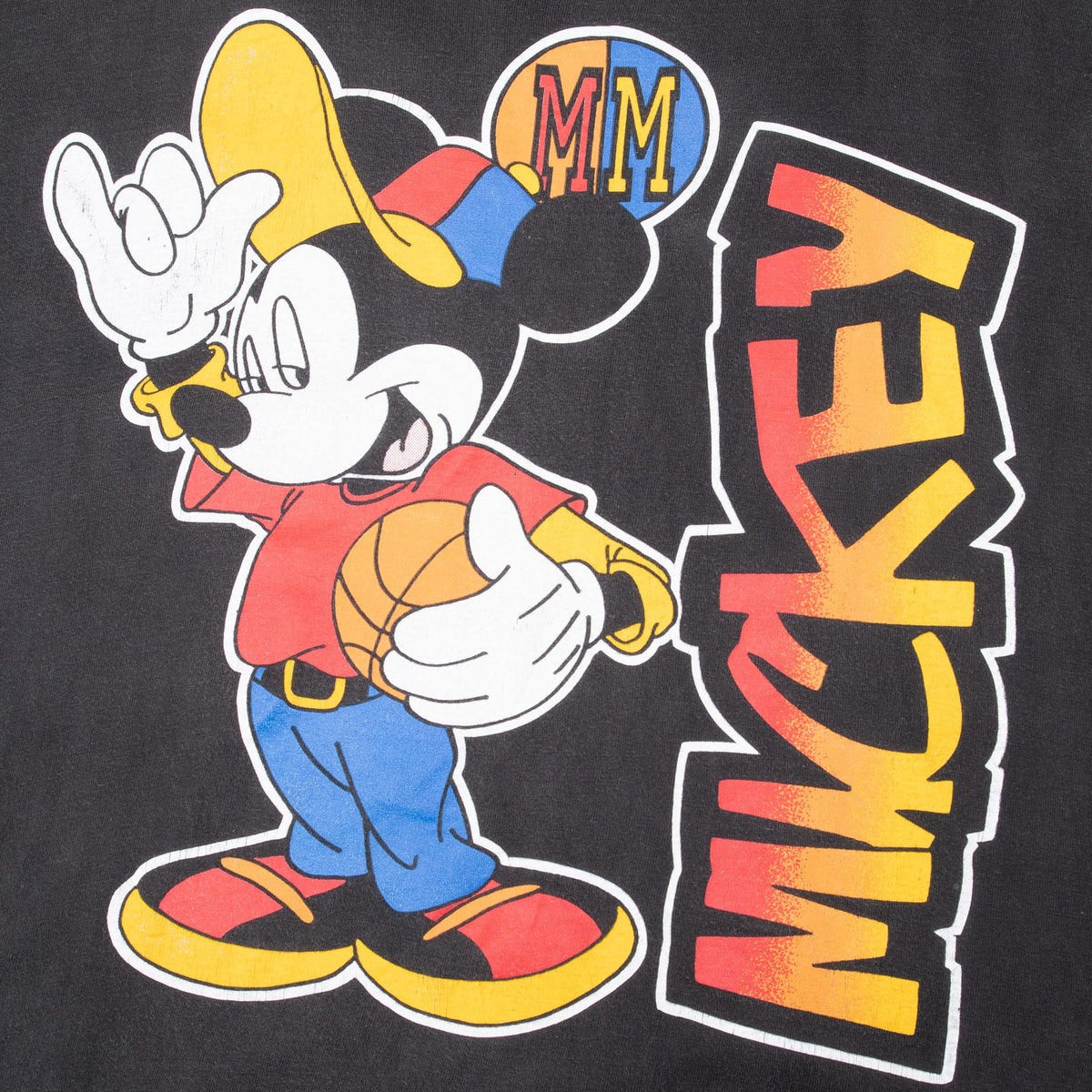 Close-up of front Mickey Mouse basketball print with red, orange, and yellow lettering