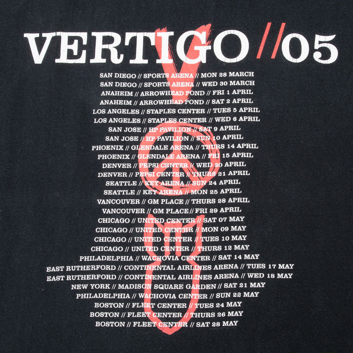 Close-up of VERTIGO // 05 back print with North American tour dates and red graphic