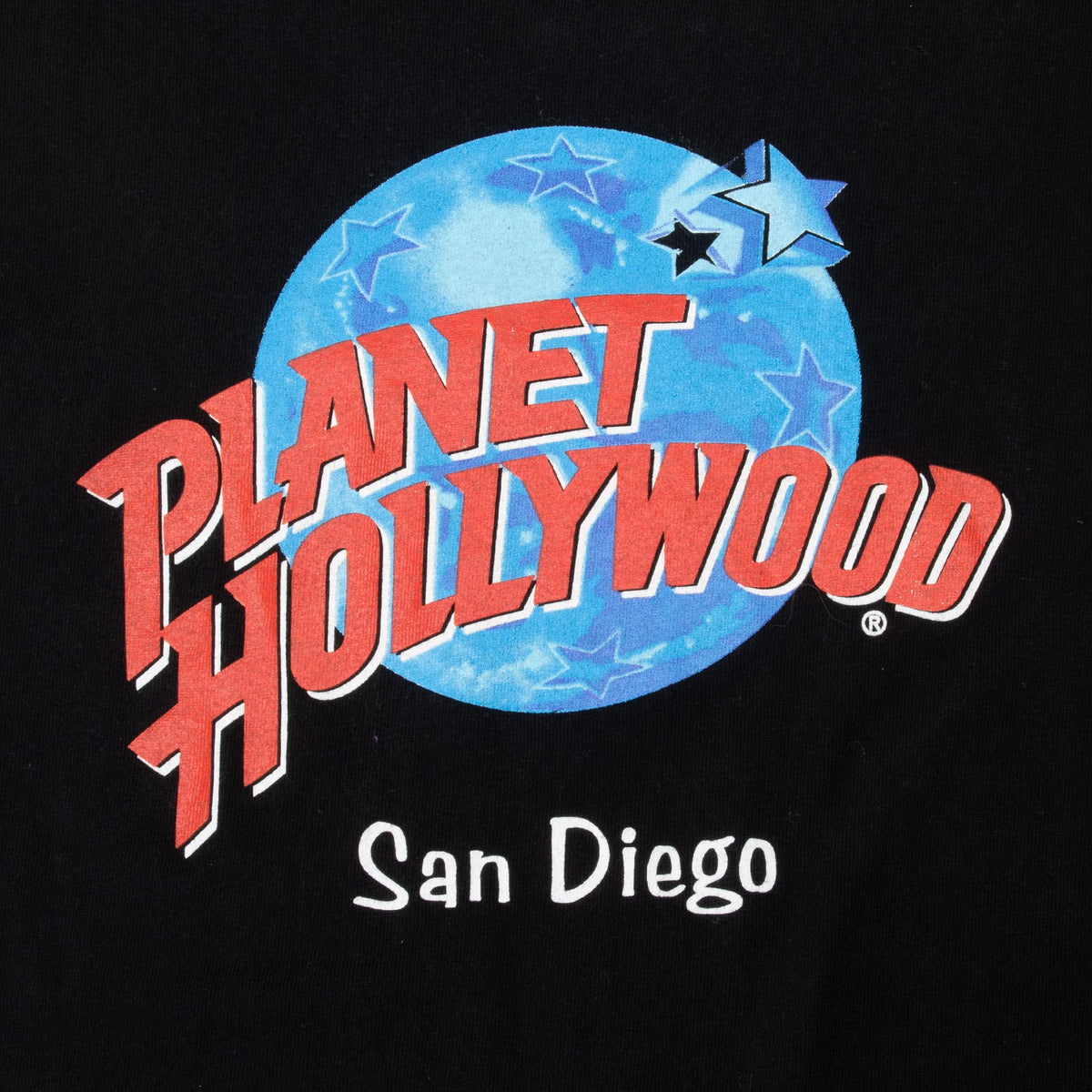 Planet Hollywood San Diego front graphic detail with red logo, blue globe and stars