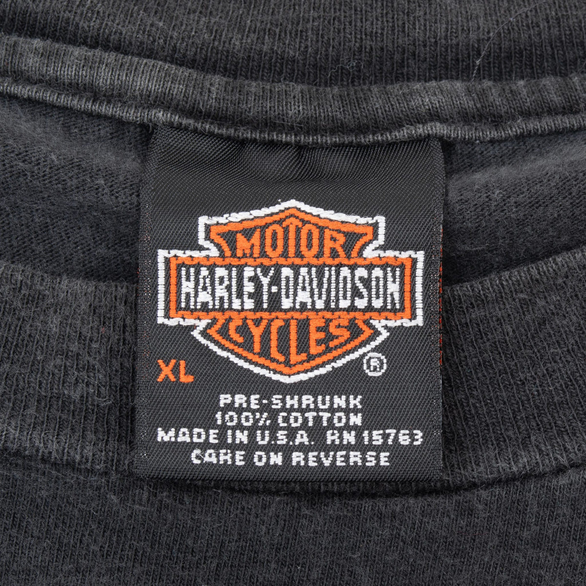 Harley-Davidson neck tag showing XL, 100% cotton and Made in USA details