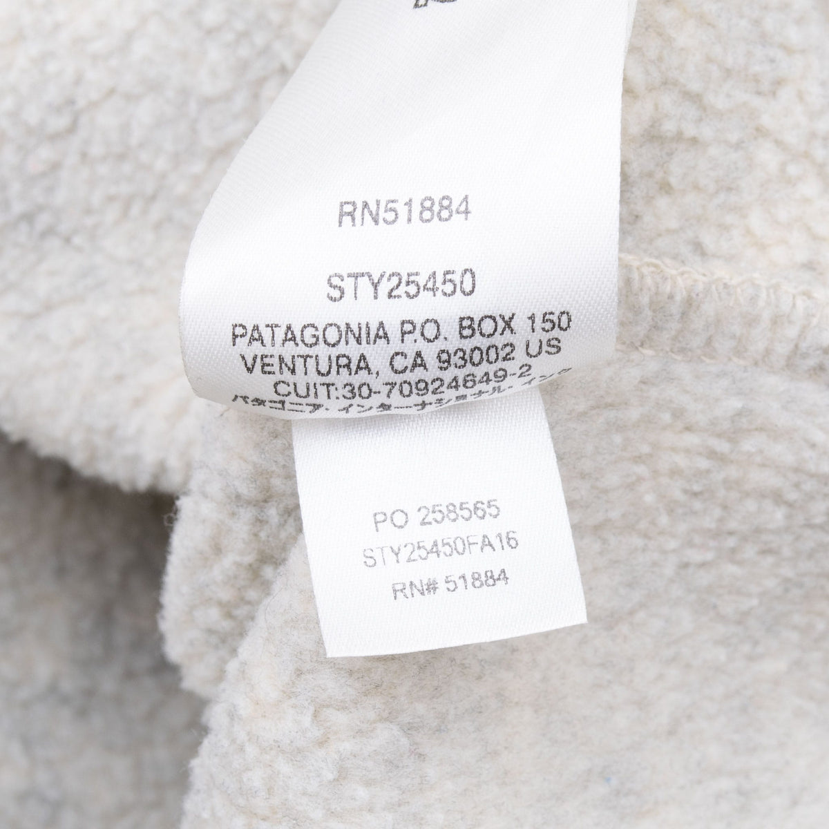 Patagonia interior care tags showing style number 25450 on beige fleece