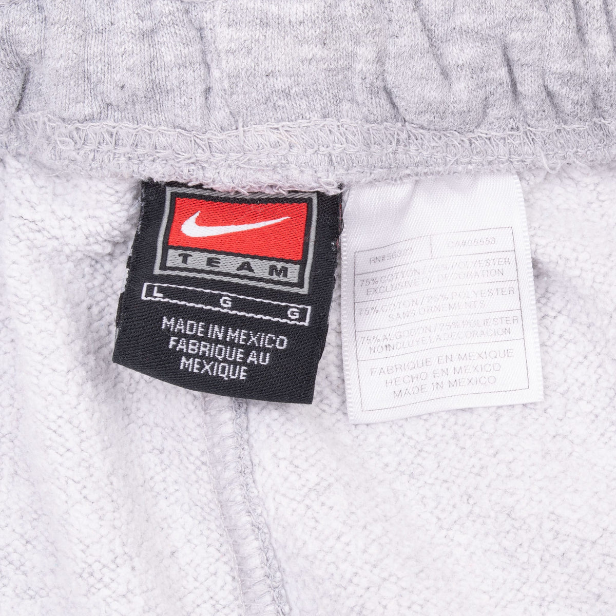 Nike Team size large waistband label and care tag inside grey sweatpants