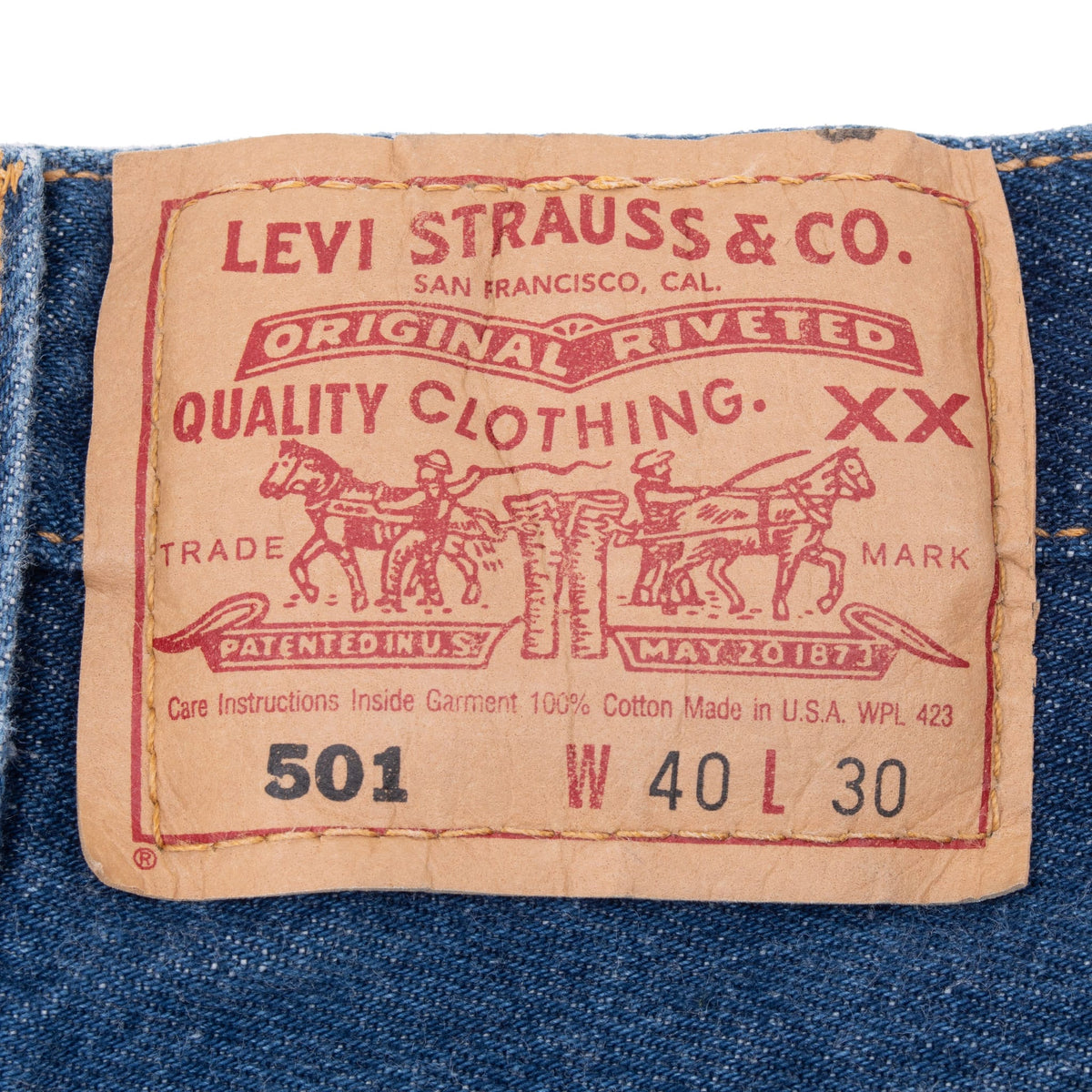 Levi Strauss & Co. 501 waist patch marked W40 L30 on blue denim