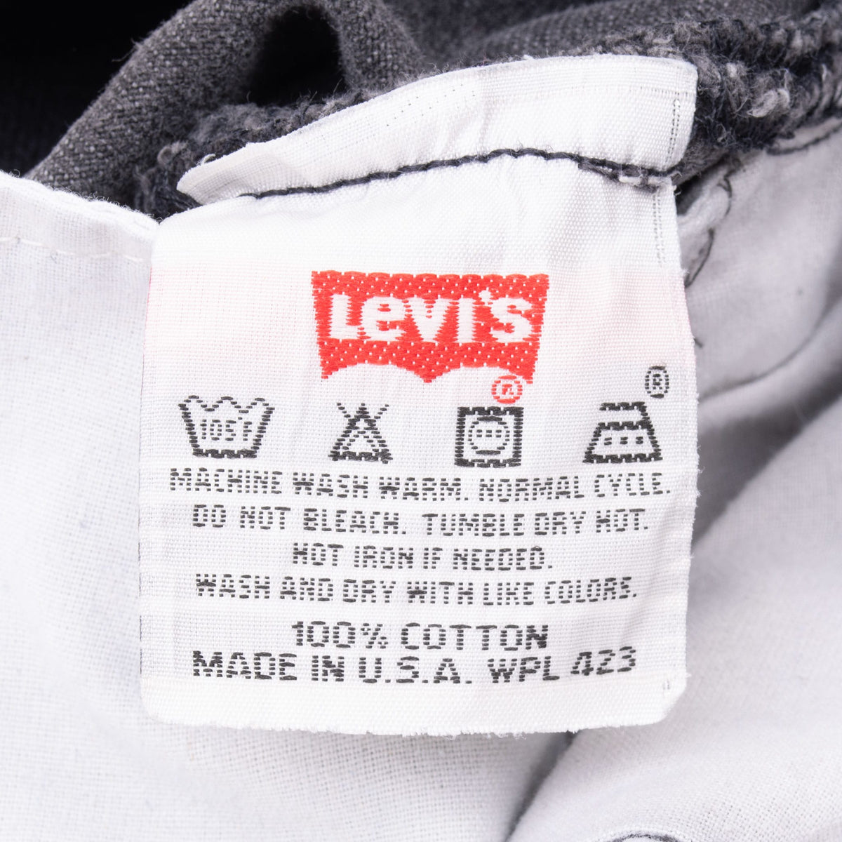 Levi's care label showing 100% cotton and made in USA