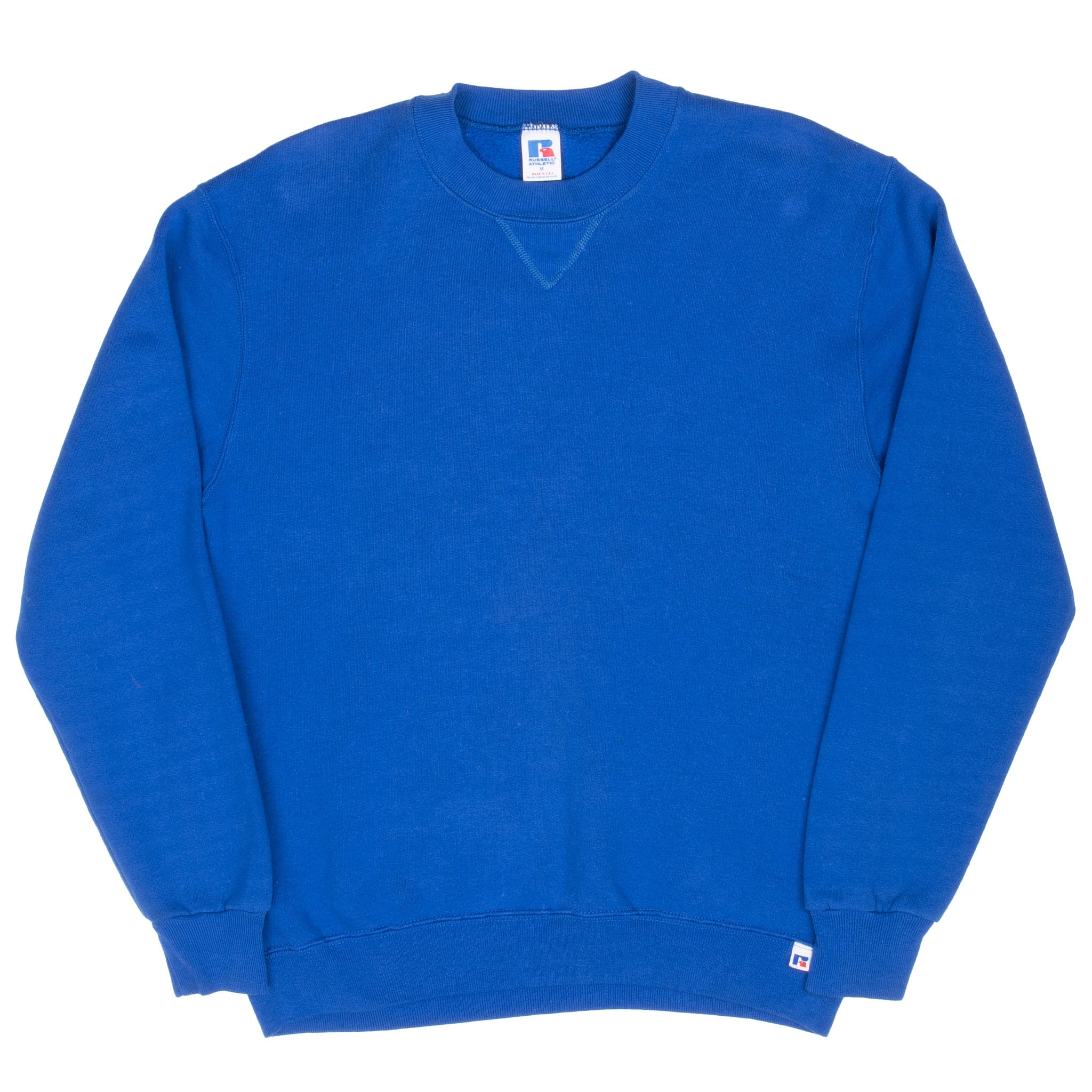 Front of blue Russell blank crewneck sweatshirt with long sleeves and ribbed trim
