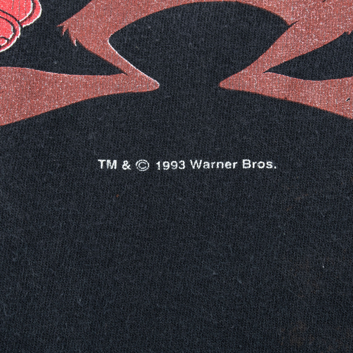 Close-up of 1993 Warner Bros. copyright text beneath the front graphic