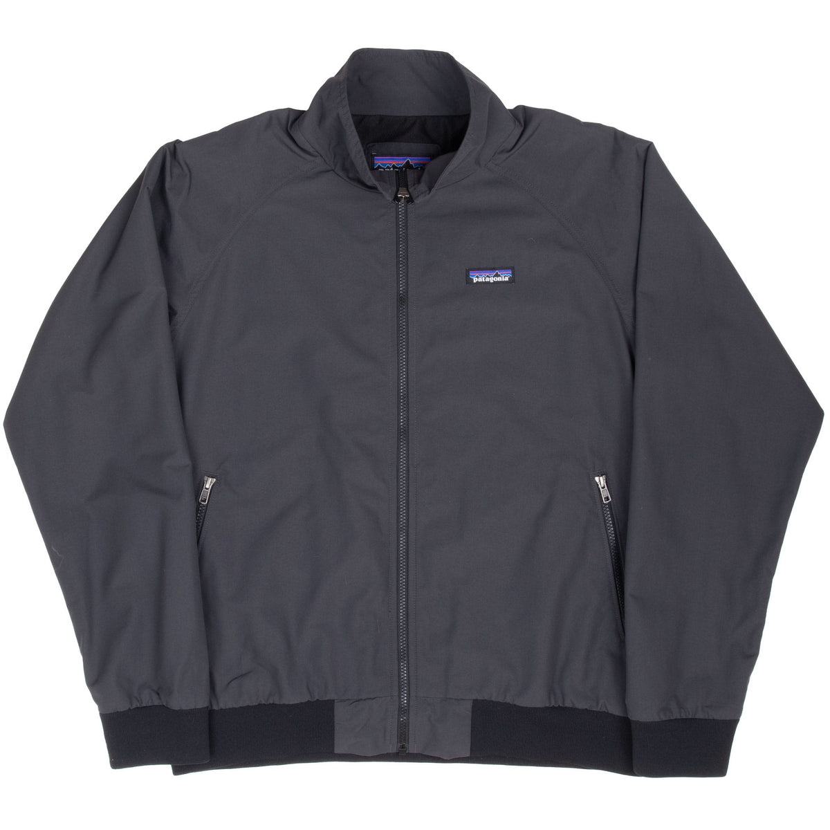 Front view of dark grey Patagonia Baggies jacket with stand collar and zippered hand pockets