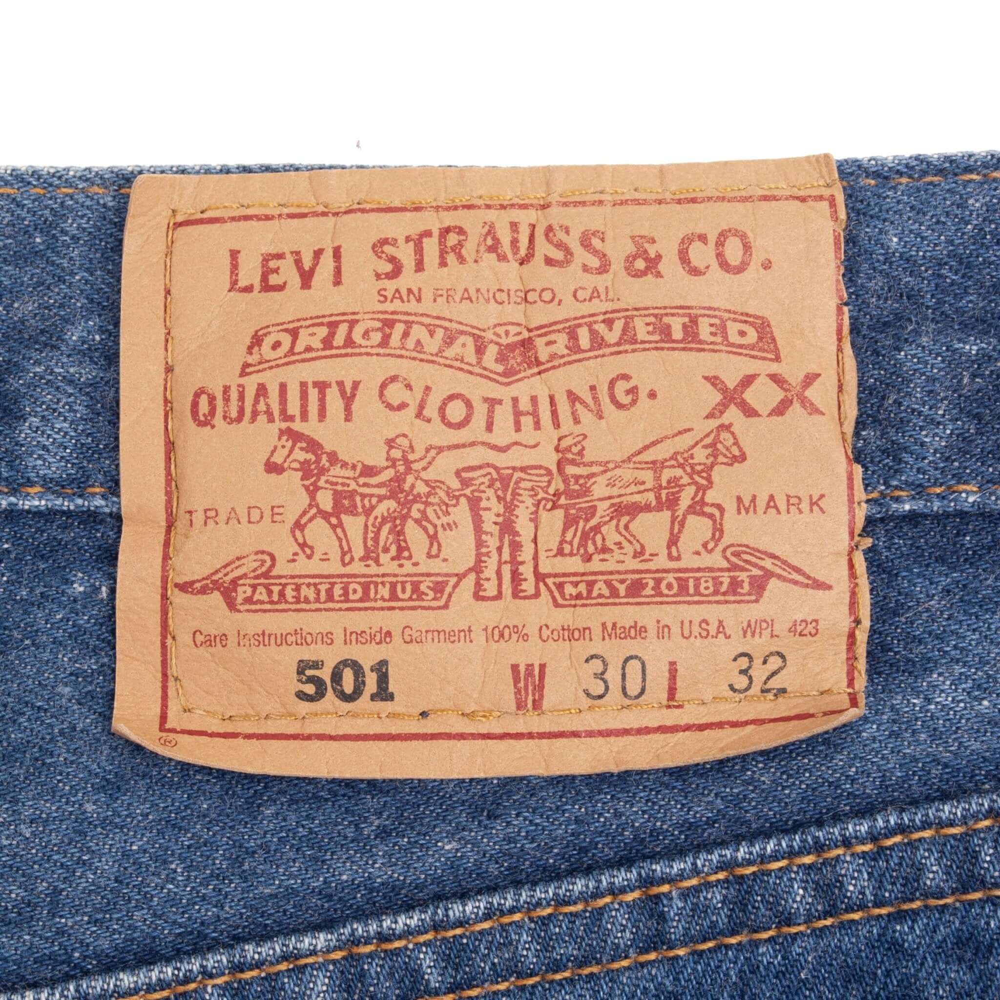 Beautiful Indigo Levis 501 Jeans 1990s Made in USA with Medium Wash Size on tag 30X32 Actual Size 29X32 Back Button #544