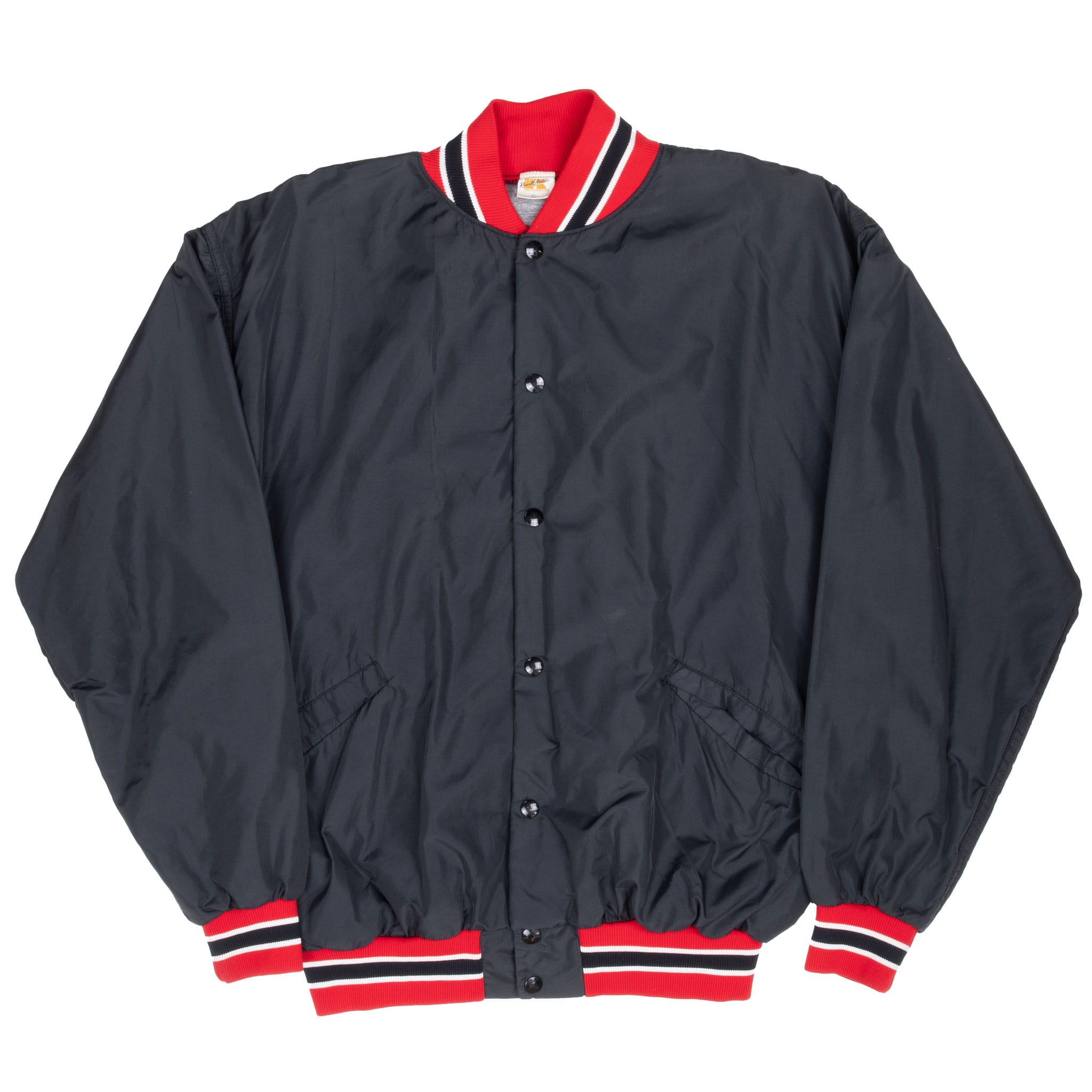 Front of black Russell Athletic bomber jacket with snap closure and striped trim