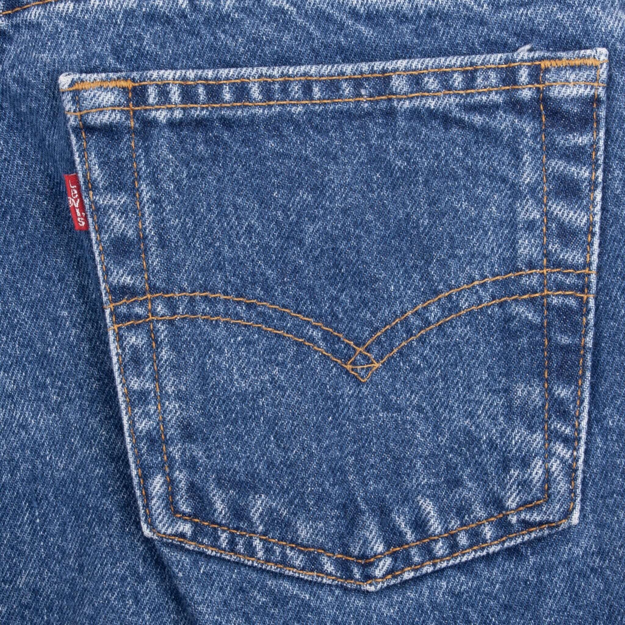 Beautiful Indigo Levis 506 Jeans 1980S Made in USA with a medium blue wash. Size on Tag 32X30 Actual Size 31X30 Back Button #585