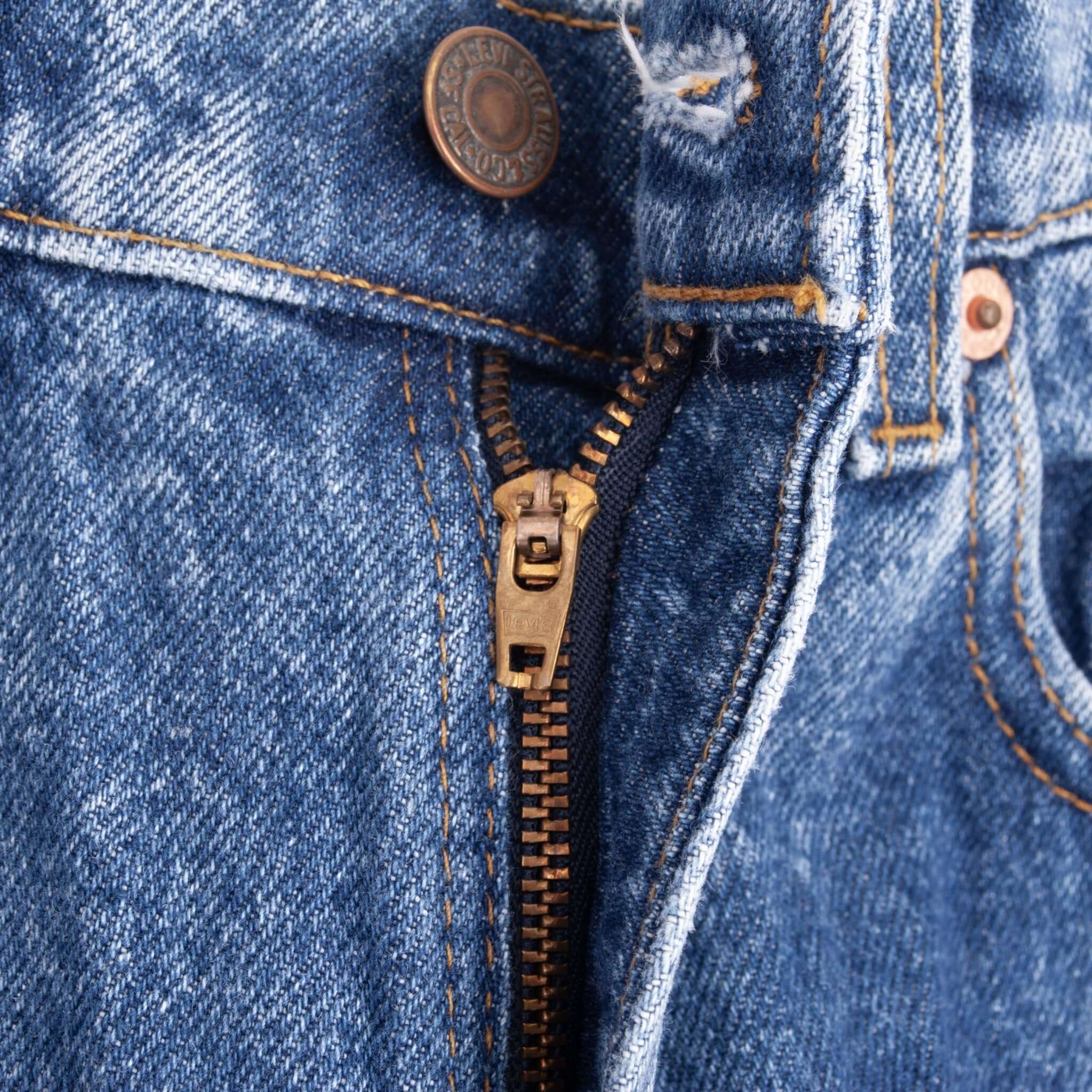 Beautiful Indigo Levis 506 Jeans 1980S Made in USA with a medium blue wash. Size on Tag 32X30 Actual Size 31X30 Back Button #585