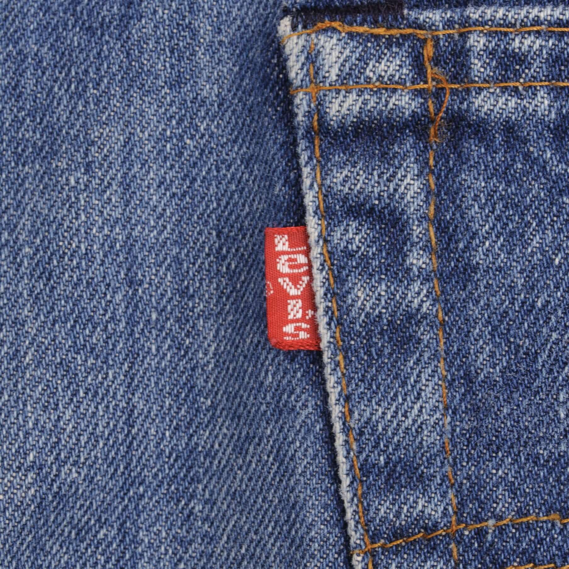 Beautiful Indigo Levis 517 Jeans With Blue Bar Tacks 1980s Made in USA with Medium Dark Wash With Light Whiskers. Size on tag 36X32 Actual Size 35X31 Back Button #650