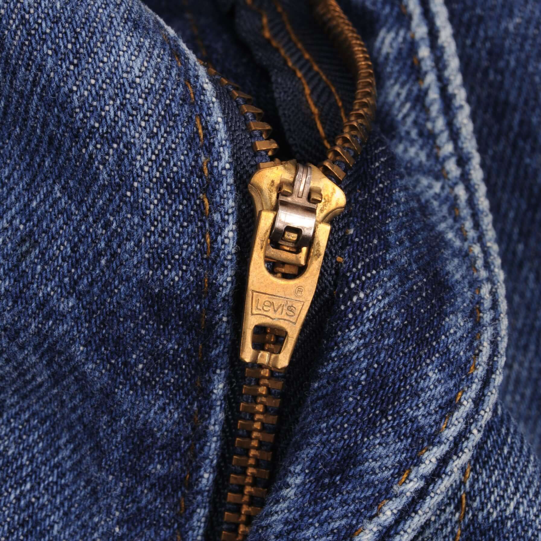 Beautiful Indigo Levis 517 Jeans With Blue Bar Tacks 1980s Made in USA with Medium Dark Wash With Light Whiskers. Size on tag 36X32 Actual Size 35X31 Back Button #650