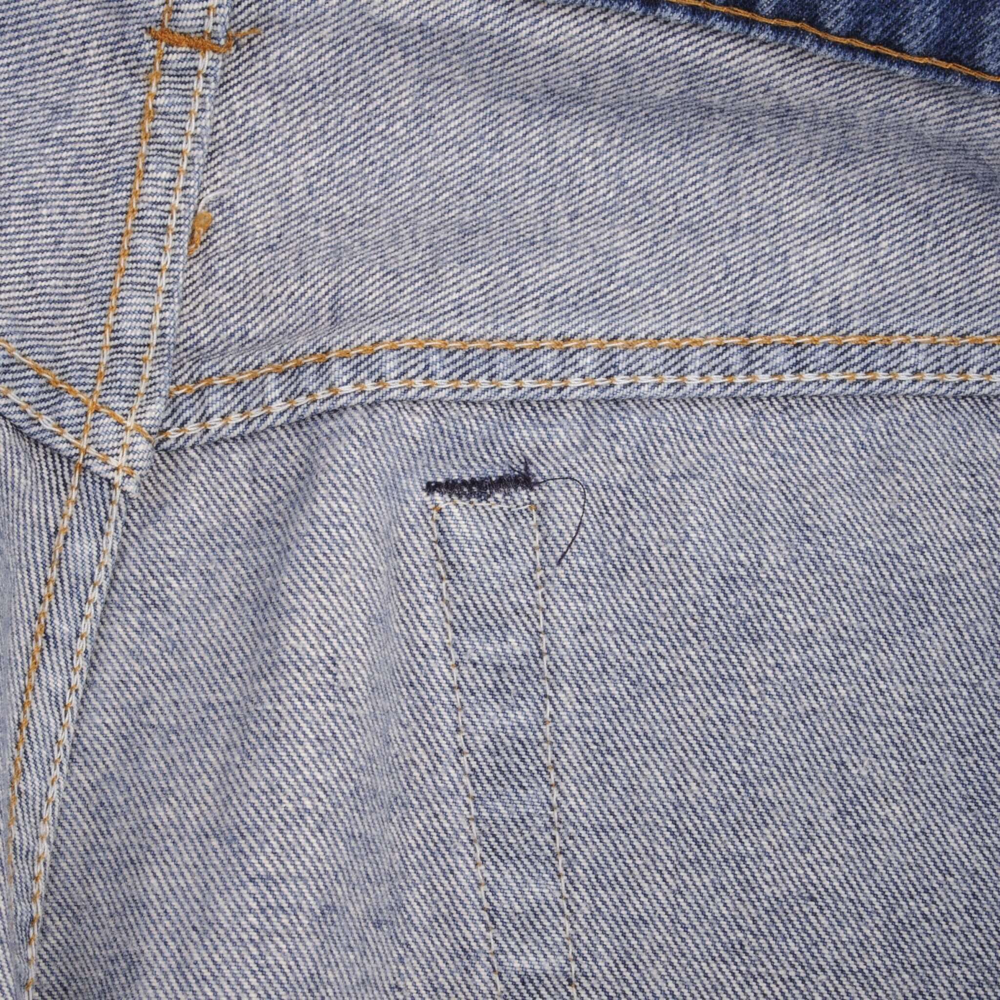 Beautiful Indigo Levis 517 Jeans With Blue Bar Tacks 1980s Made in USA with Medium Dark Wash With Light Whiskers. Size on tag 36X32 Actual Size 35X31 Back Button #650