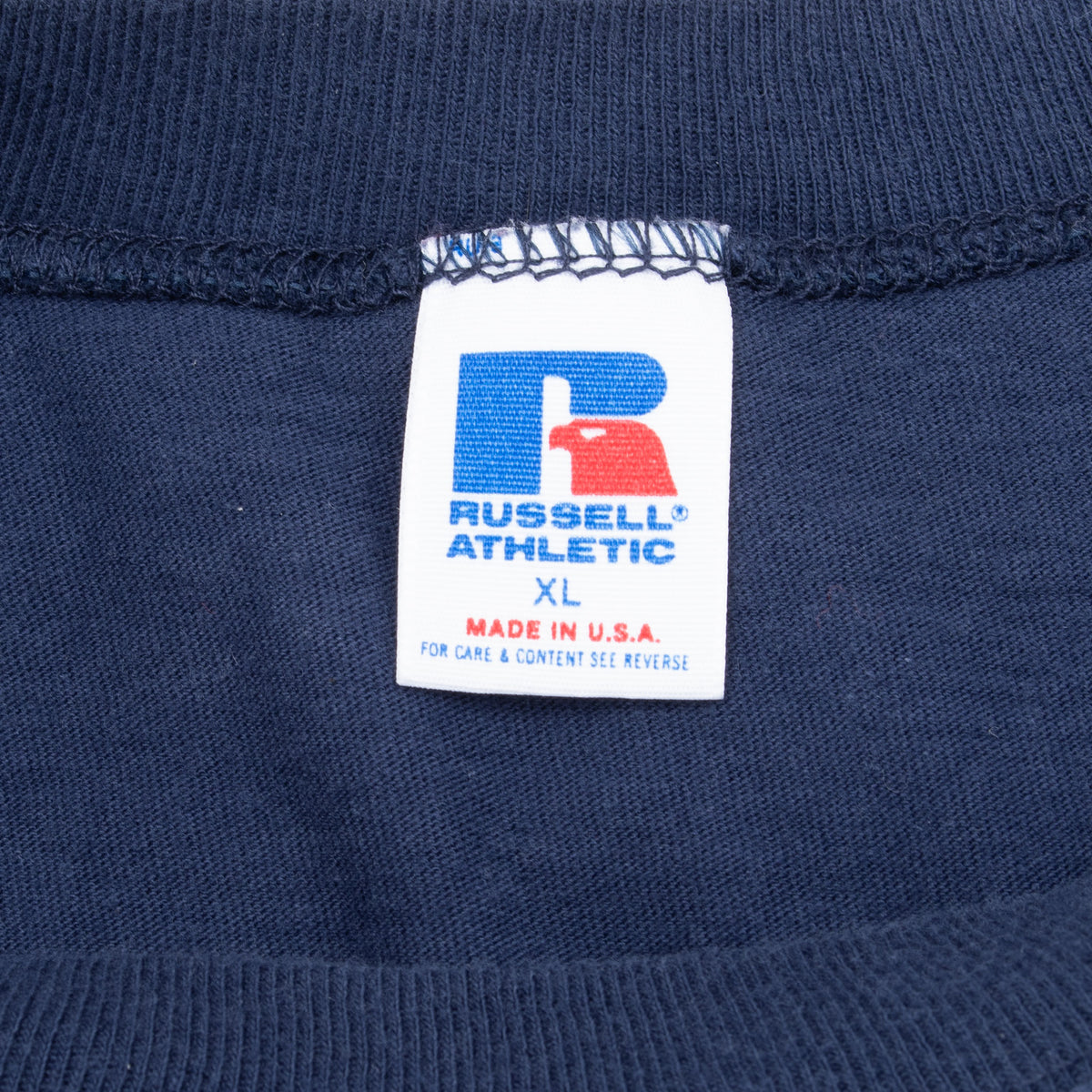Russell Athletic XL neck tag on navy T-shirt