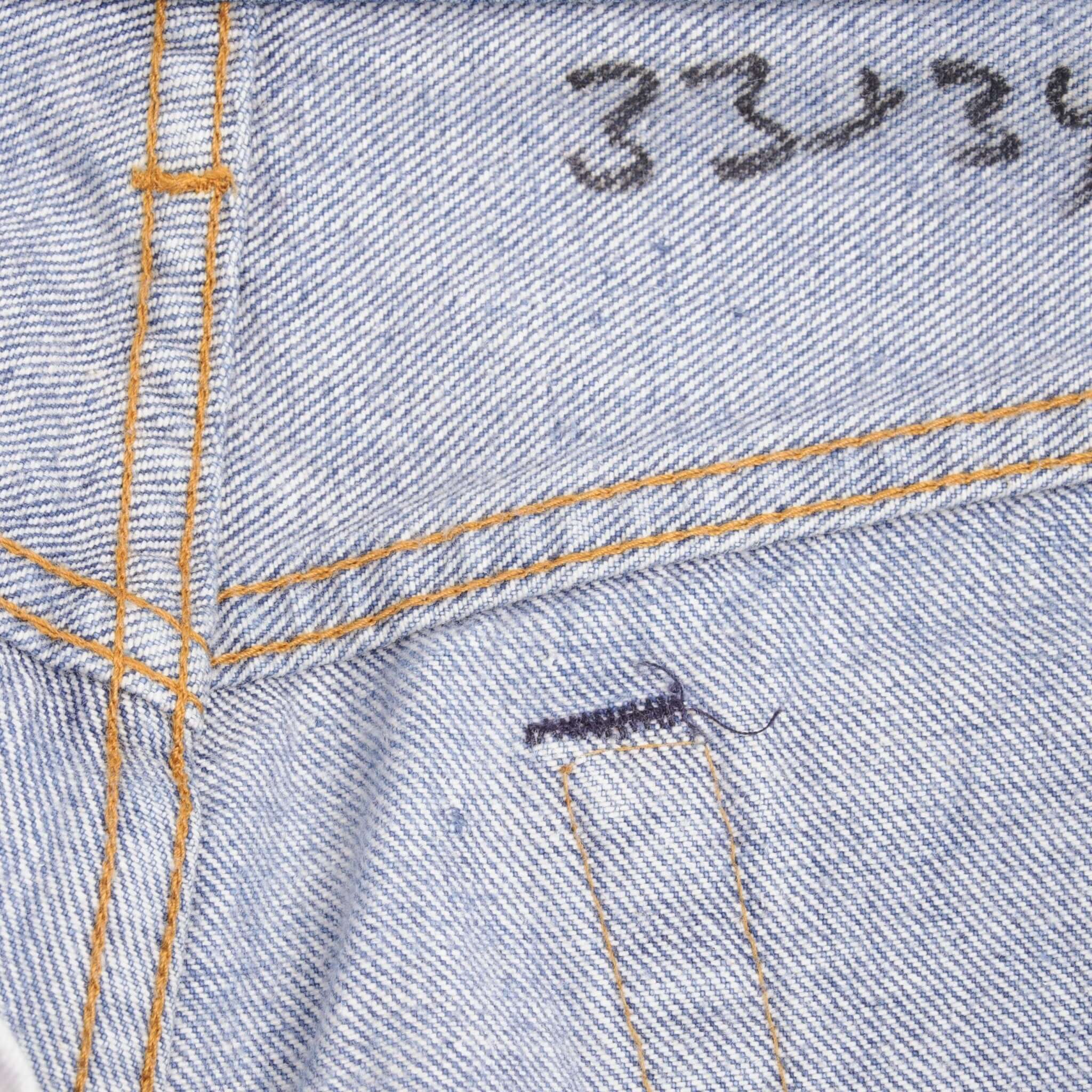 Beautiful Indigo Levis 517 Jeans With Blue Bar Tacks 1980s Made in USA with Medium Dark Wash With Light Whiskers. Size on tag 34X34 Actual Size 33X34 Back Button #650