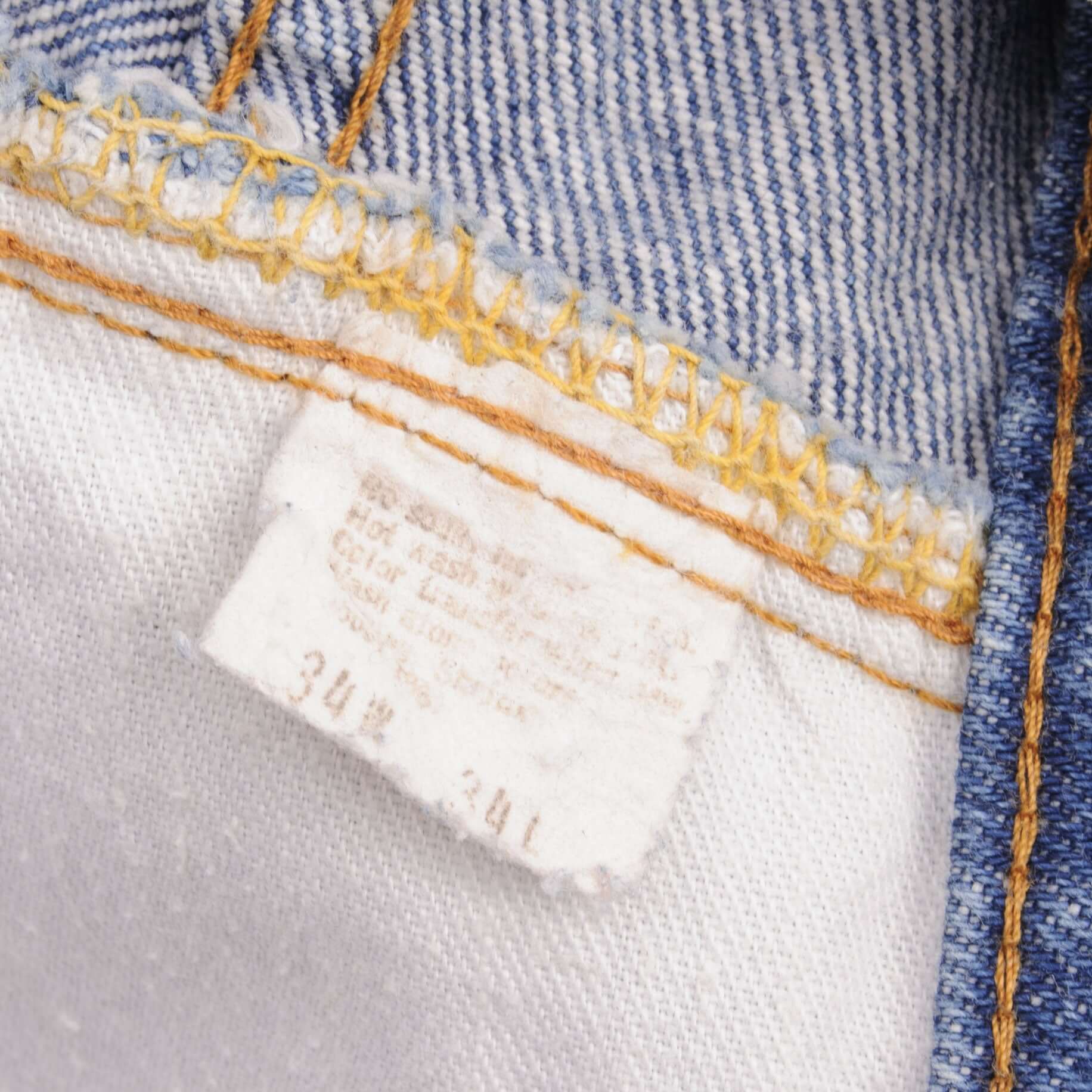 Beautiful Indigo Levis 517 Jeans With Blue Bar Tacks 1980s Made in USA with Medium Dark Wash With Light Whiskers. Size on tag 34X34 Actual Size 33X34 Back Button #650