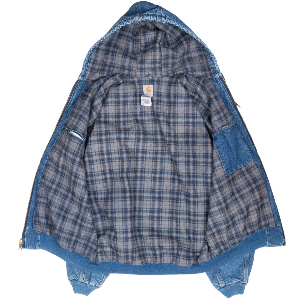 Open Carhartt denim jacket showing plaid lining and interior pocket