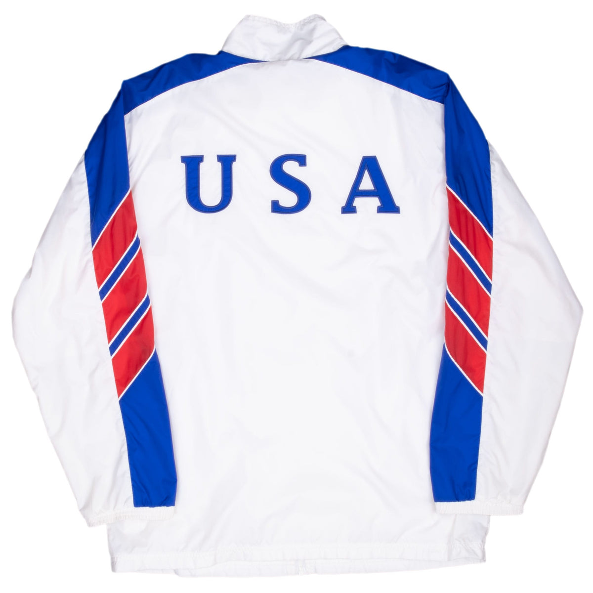 Back of white adidas Team USA jacket with large blue USA lettering and red-and-blue sleeve panels