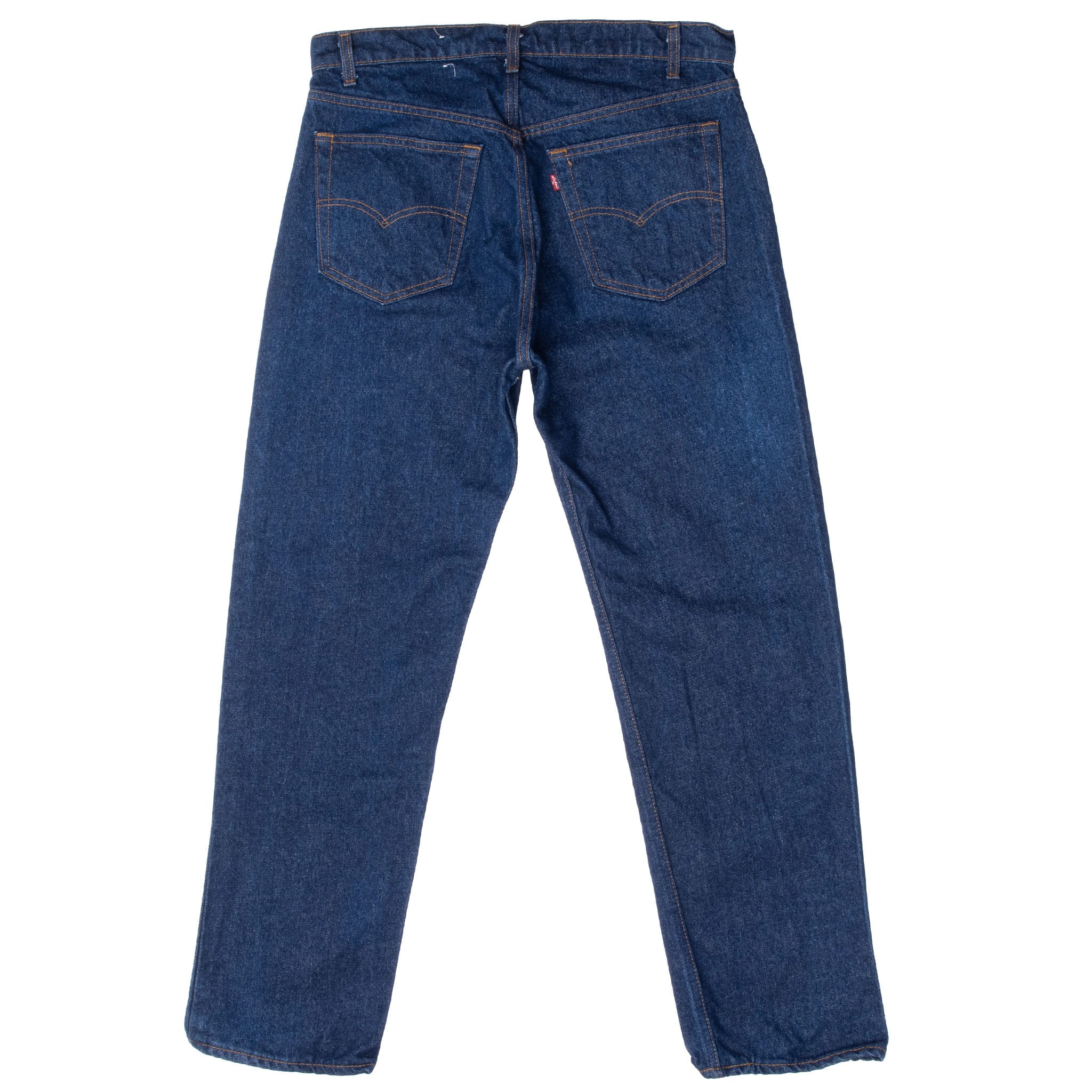 Back view of Levi's 505 dark indigo jeans with arcuate-stitched pockets and red tab