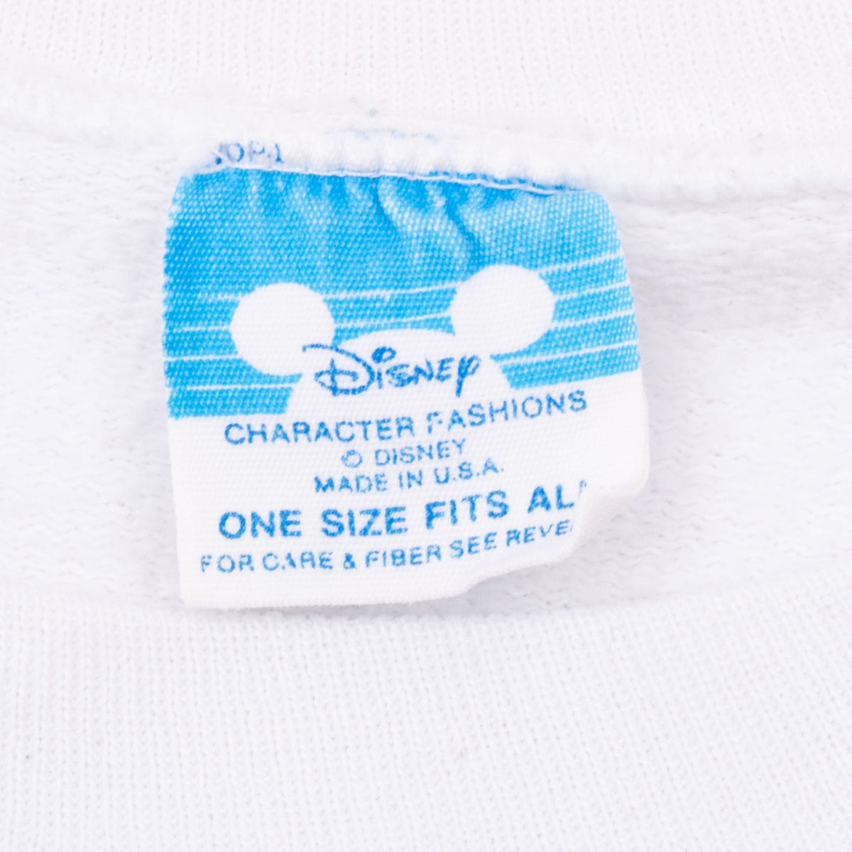 Disney Character Fashions neck label marked one size fits all and made in USA