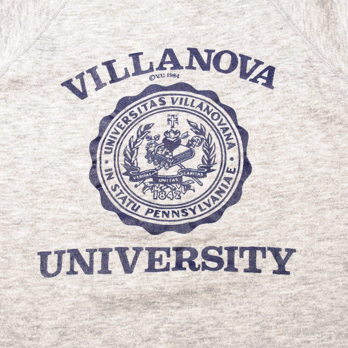 Close-up of navy Villanova University seal print on gray sweatshirt