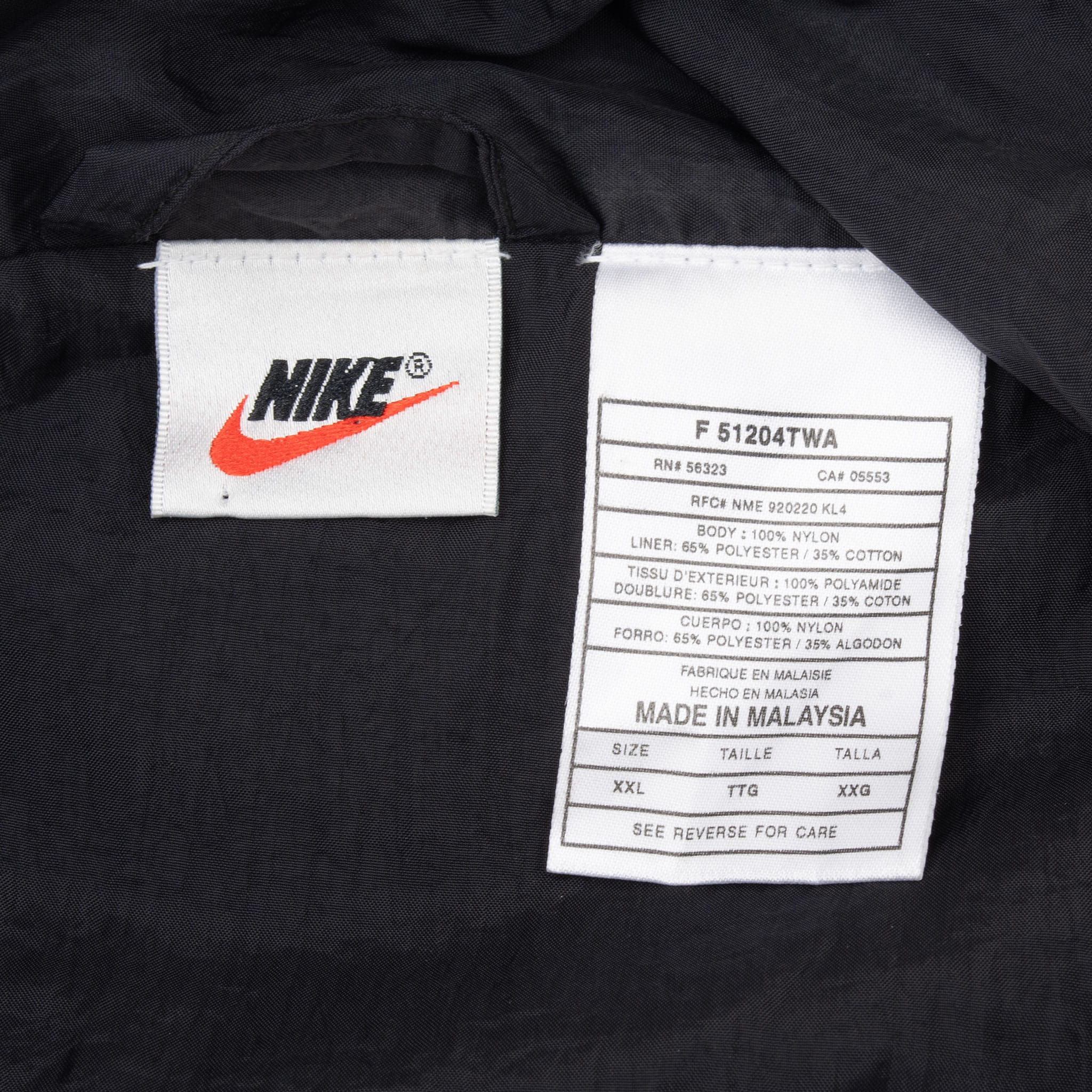 Nike neck and care labels showing style details and size 2XL