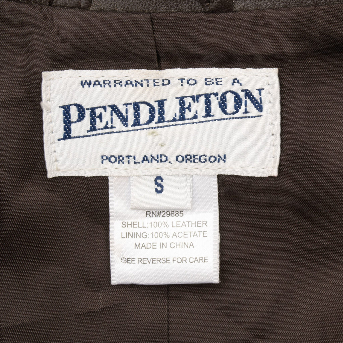Pendleton neck and size S tags inside brown leather blazer