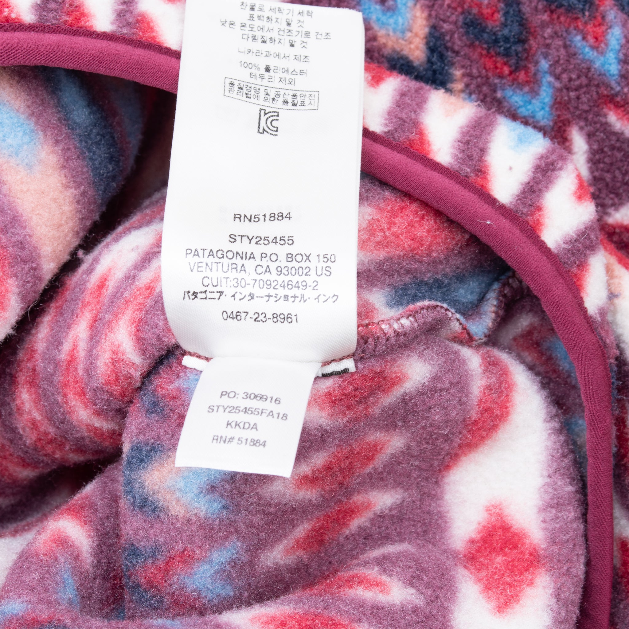 Interior care labels showing Patagonia style 25455 on geometric-print fleece