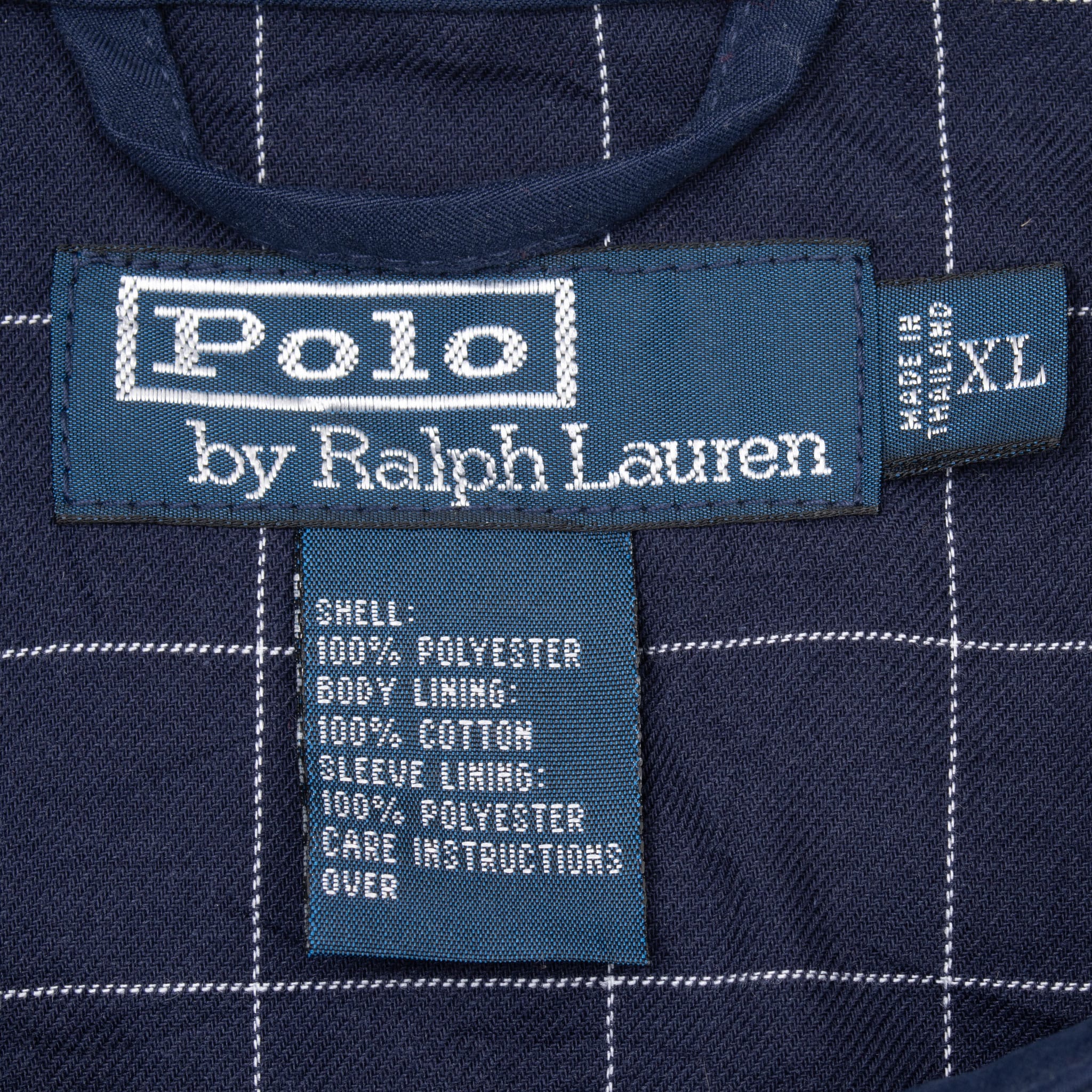 Polo by Ralph Lauren neck and size XL labels inside blue jacket