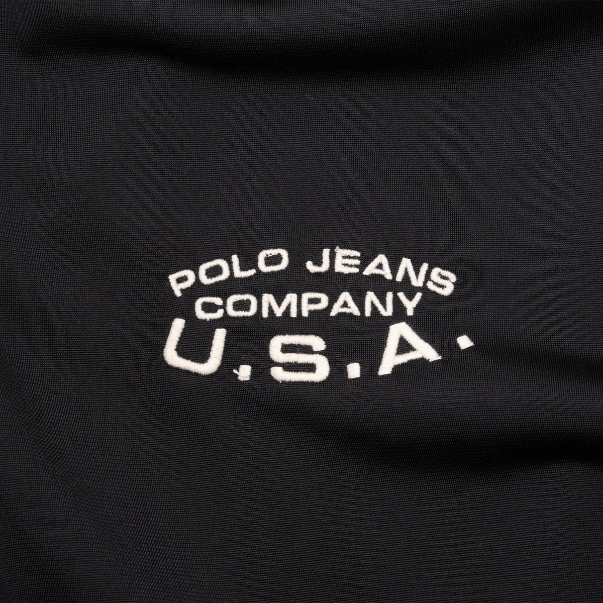 White Polo Jeans Company U.S.A. chest embroidery on black fabric