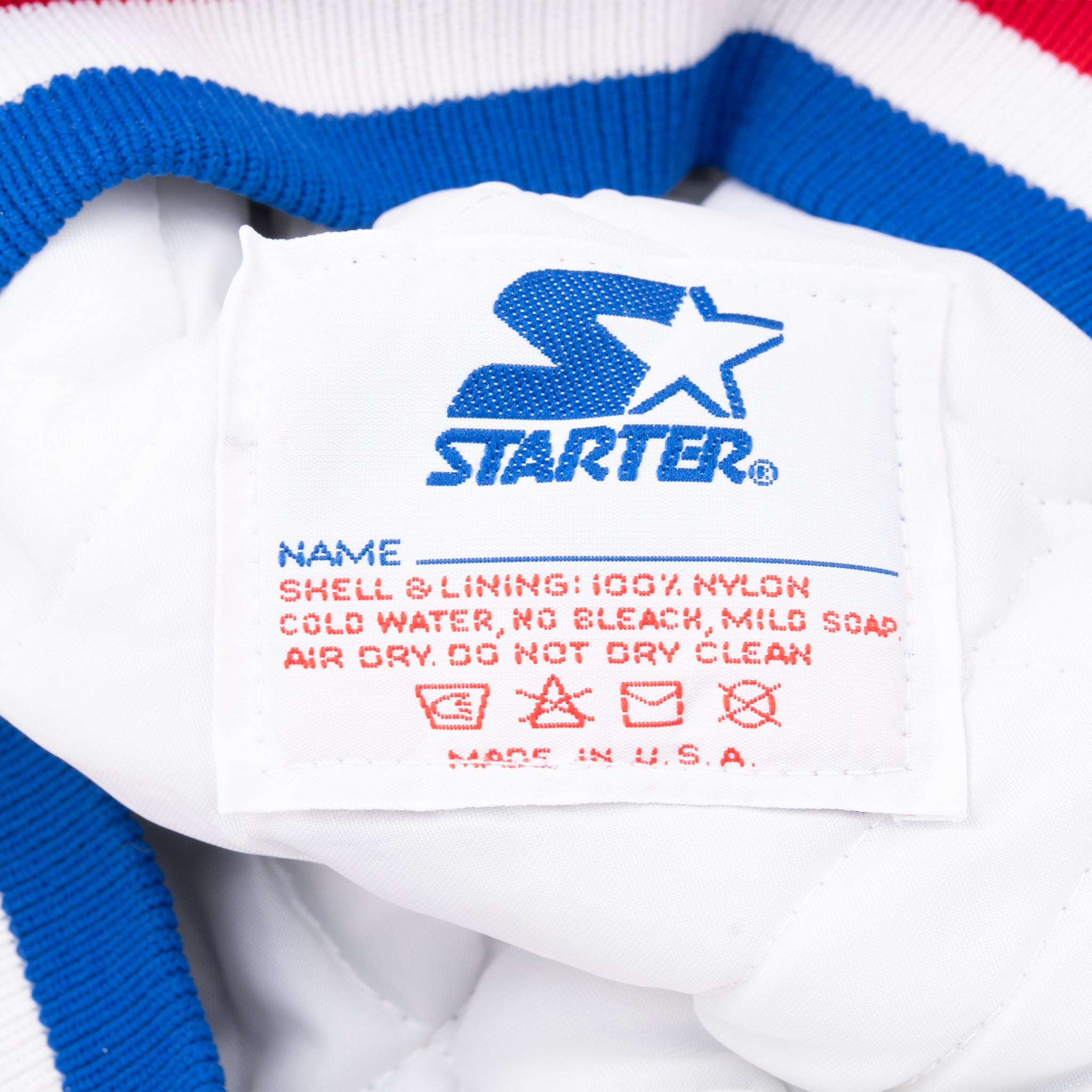 Starter care label with shell and lining details and Made in U.S.A. text