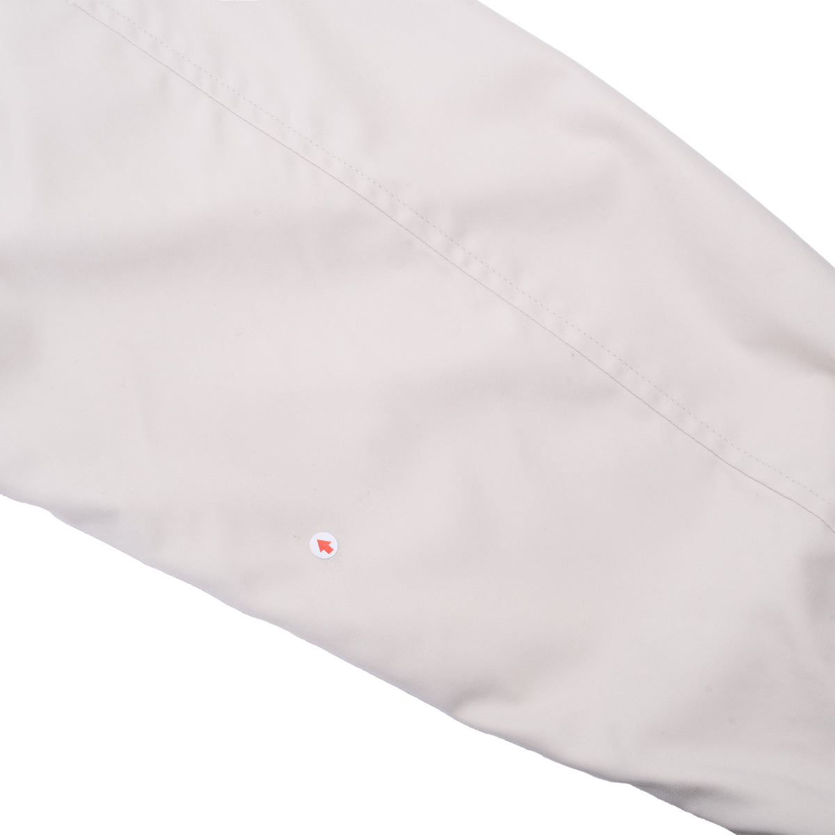 Close-up of beige Polo Ralph Lauren jacket sleeve and stitched seam