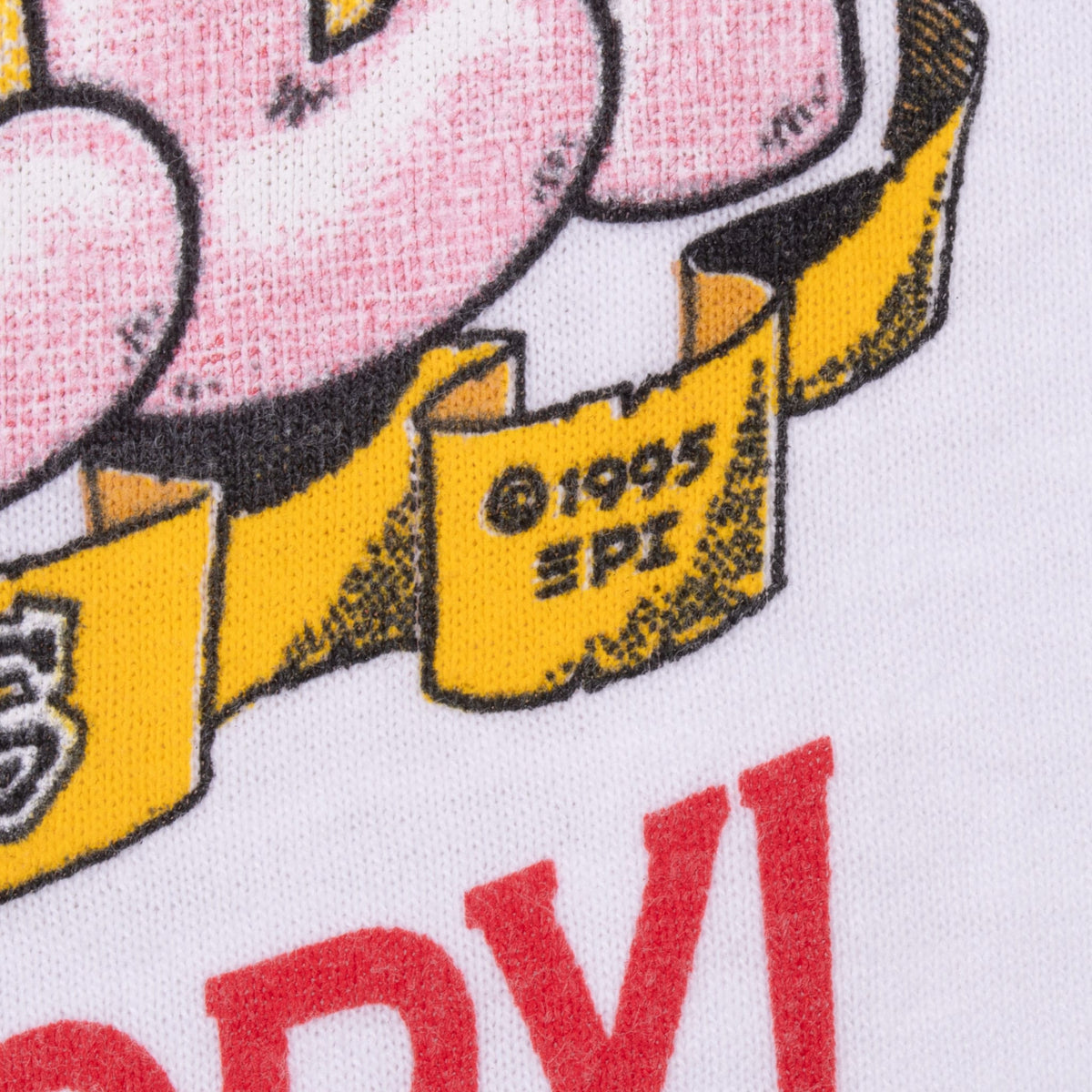 Close-up of yellow ribbon in the front print with 1995 EPC copyright mark