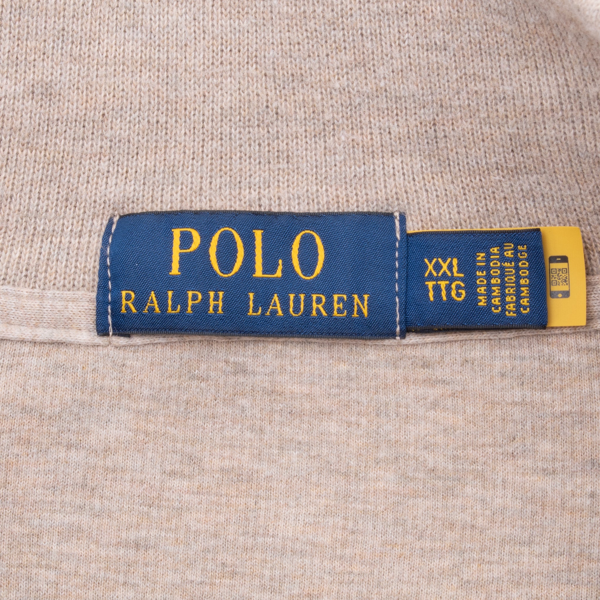 Polo Ralph Lauren neck label and XXL size tag on beige knit fabric