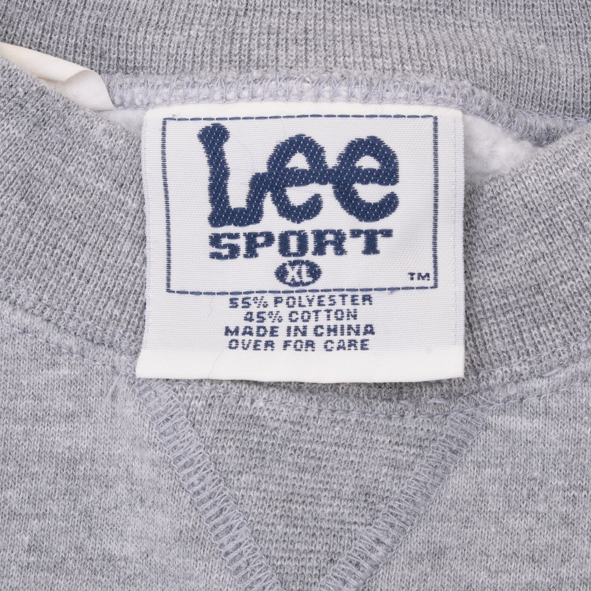 Close-up of Lee Sport XL neck label inside gray sweatshirt