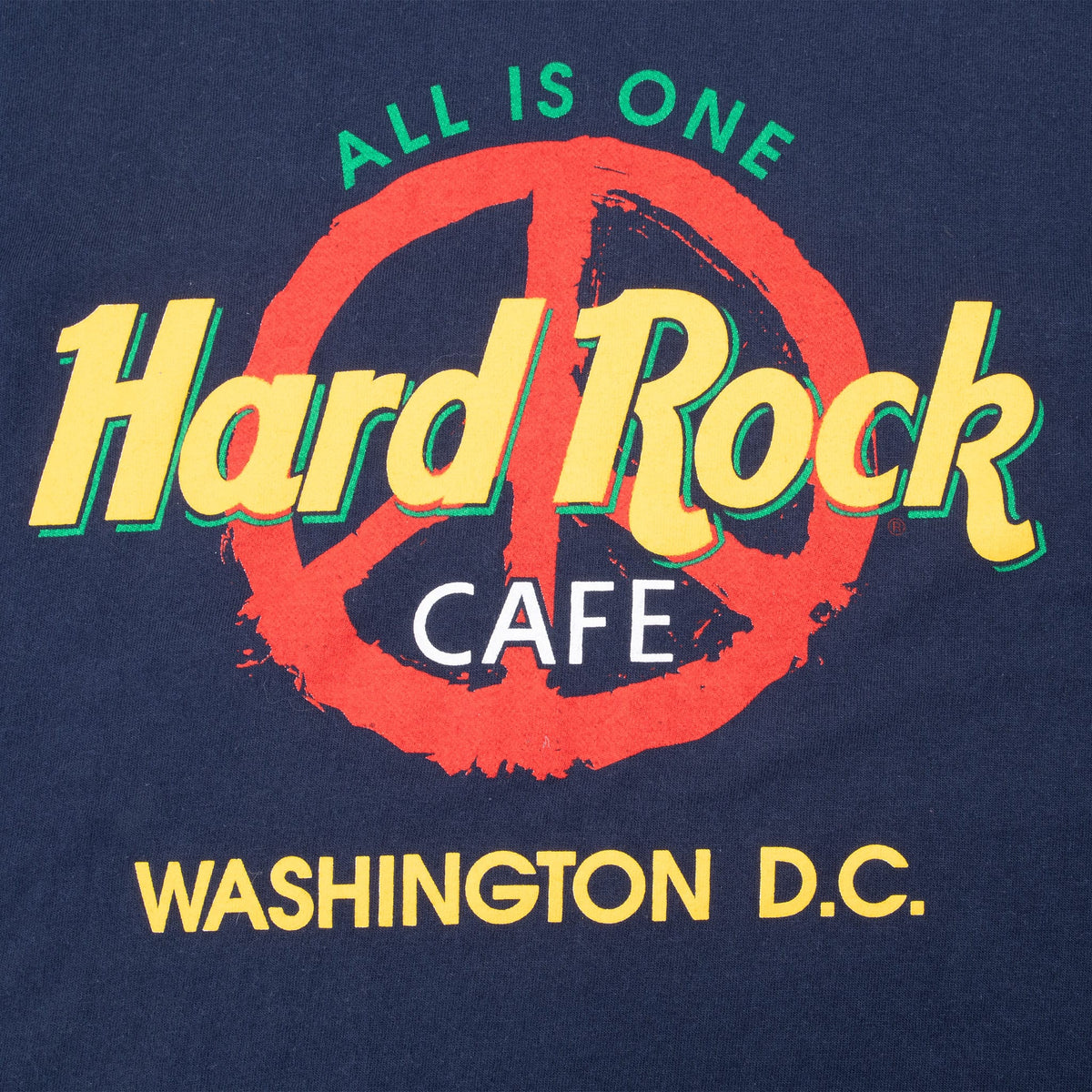 Close-up of Hard Rock Cafe All Is One Washington, D.C. graphic with red peace symbol